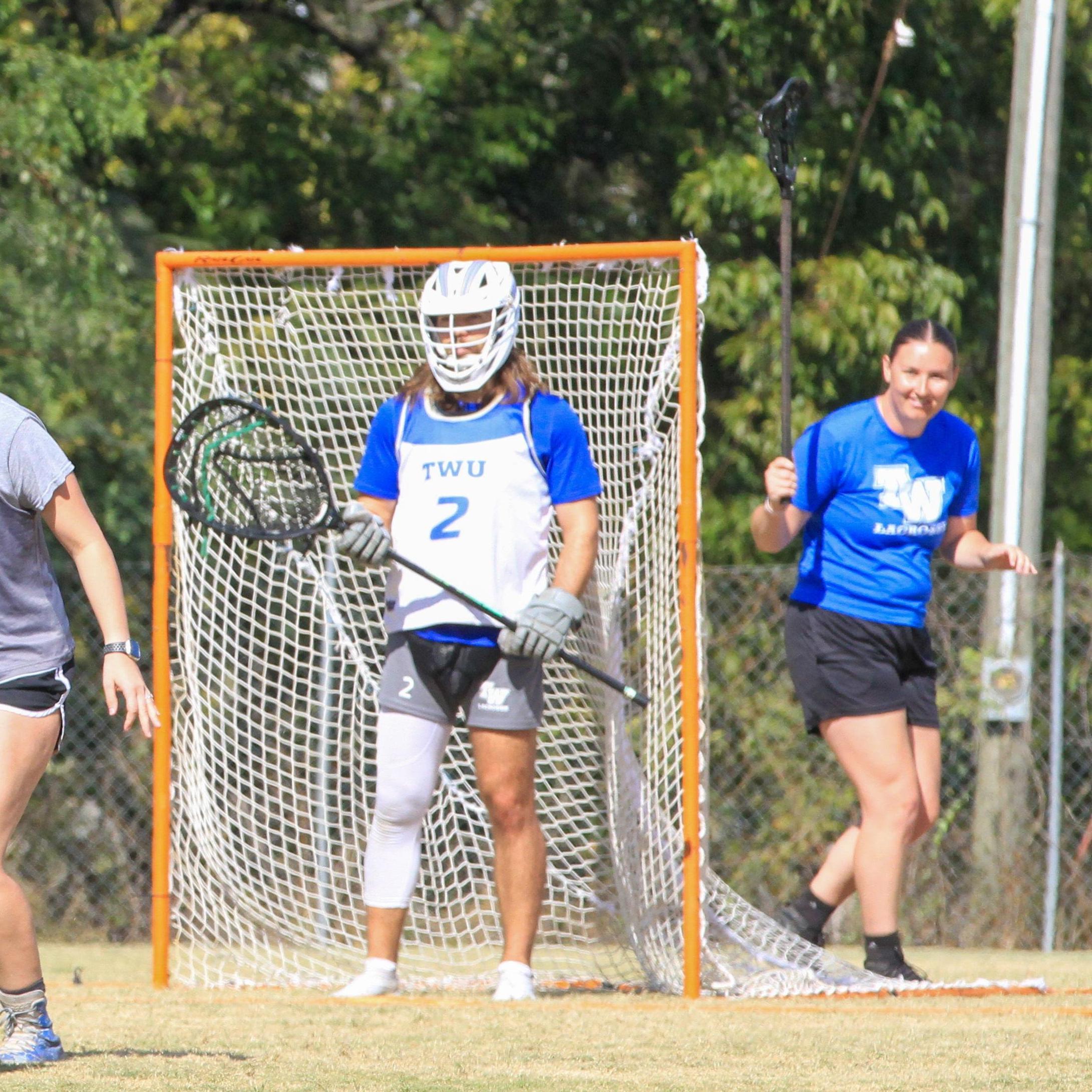 Yearly tradition of Kyle playing goalie for the women's alumni team