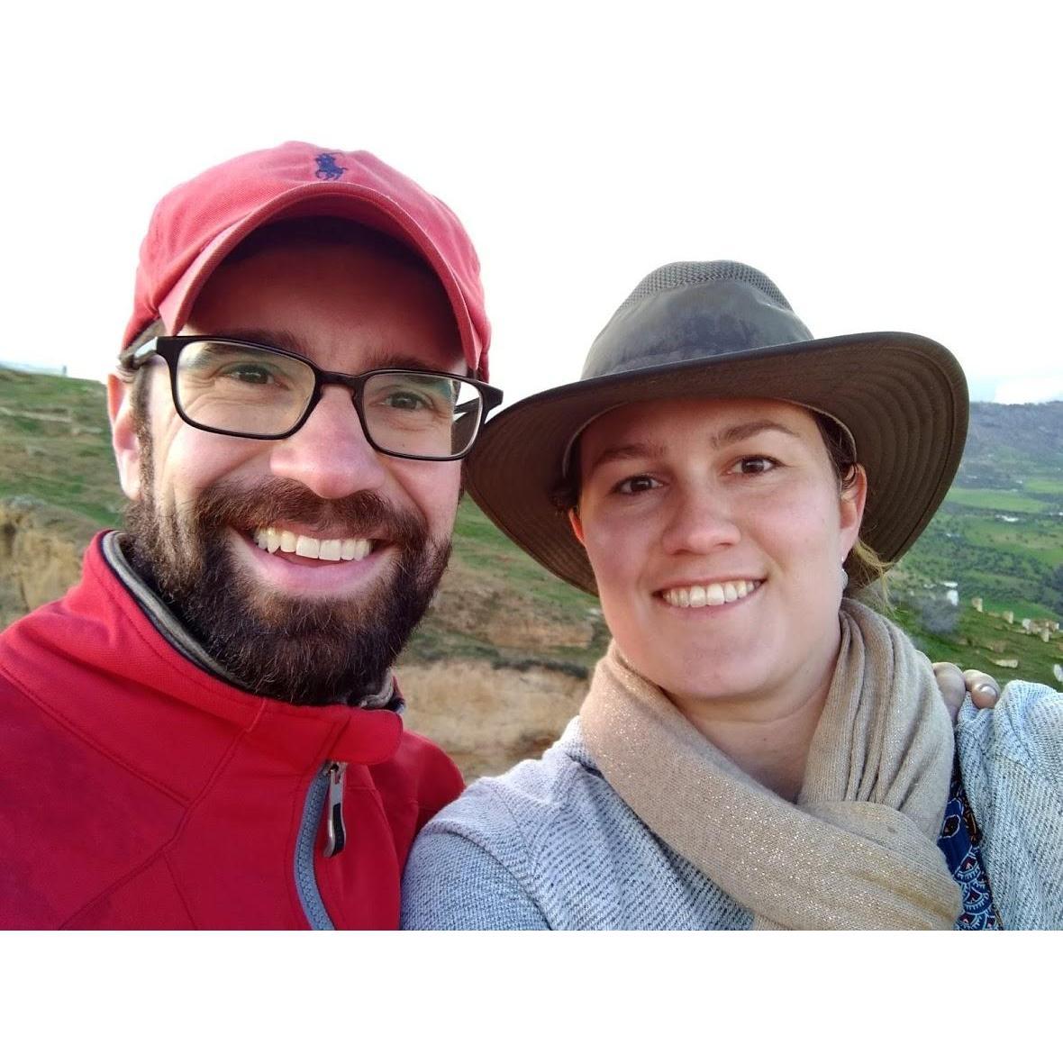 Probably our favorite trip ever: Morocco! It's also where we decided to tie the knot and hunted until we found the perfect ring! Here we are in the rolling hills of Fez after hiking among ruins.