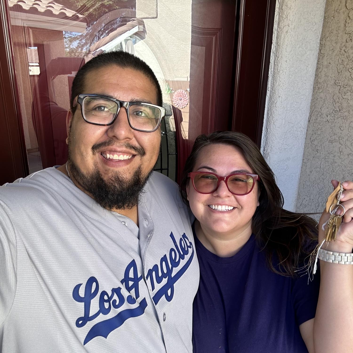 Getting the keys to our first home together.