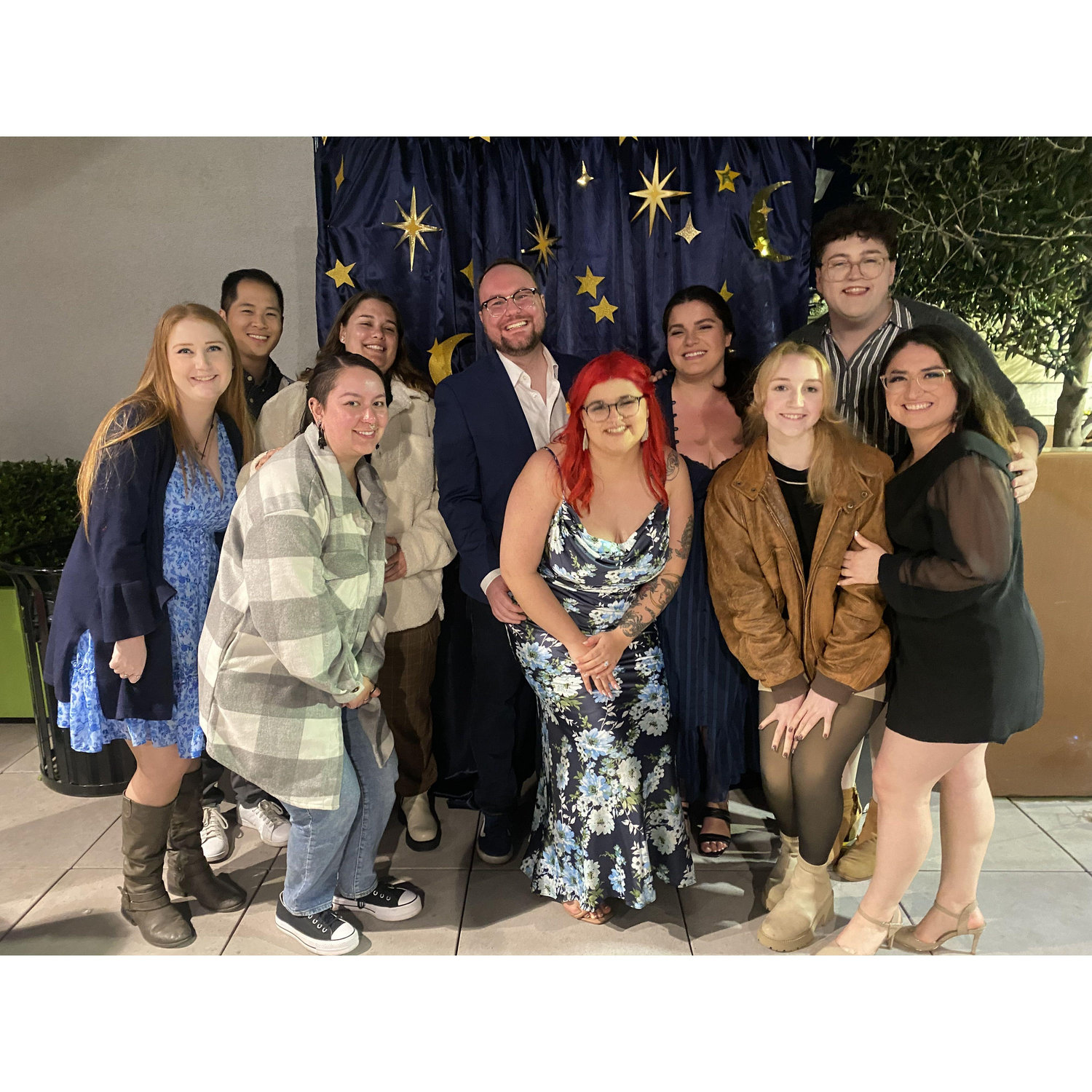 Nina was surprised by friends and family waiting on their rooftop after John proposed!