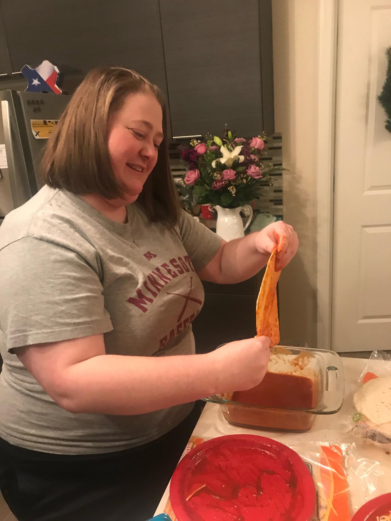 Allie asked for Ivy's help making food for a friend . . . Allie was not loving the enchilada making process.