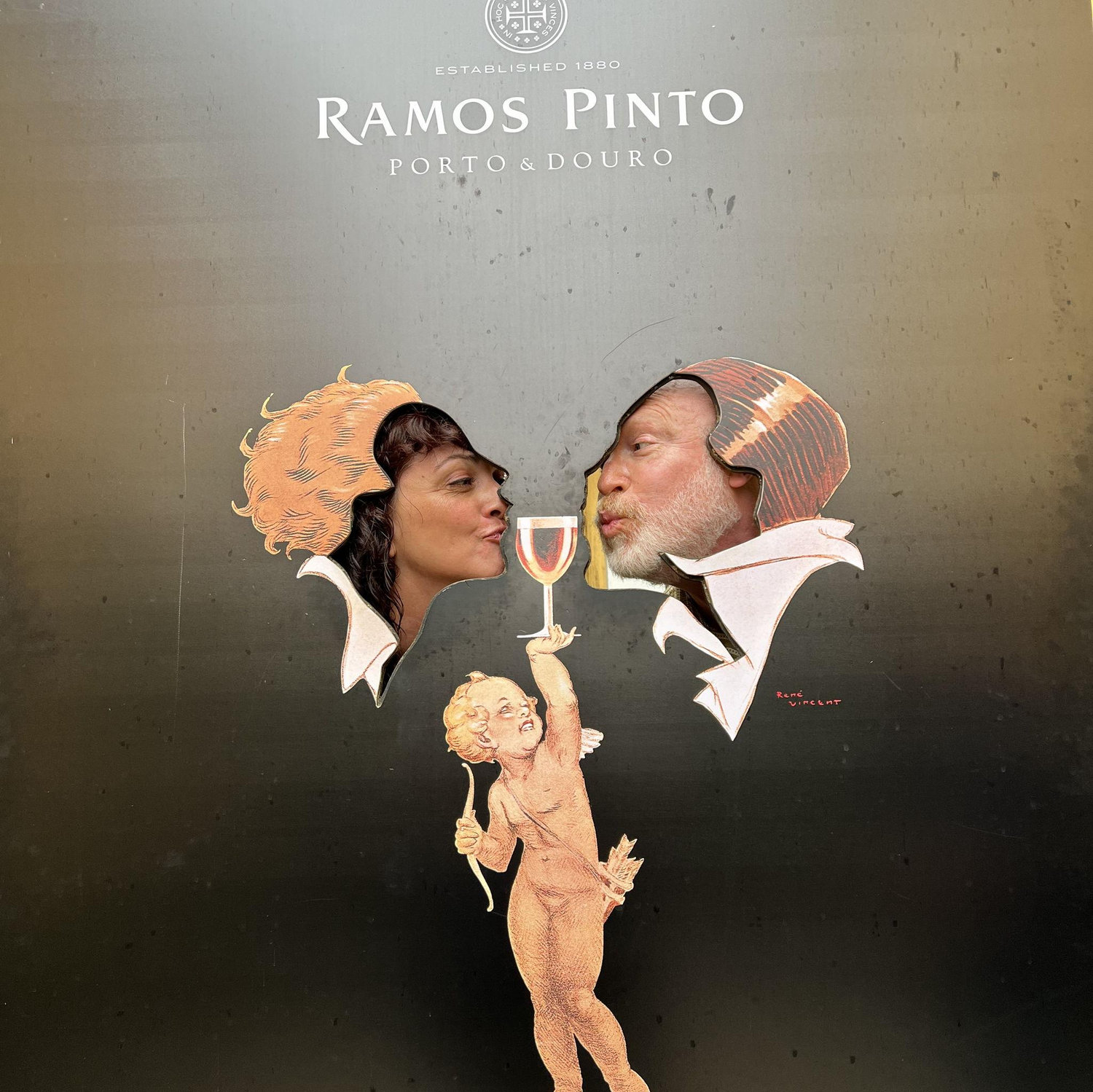 Having fun touring a port wine cellar in Porto.