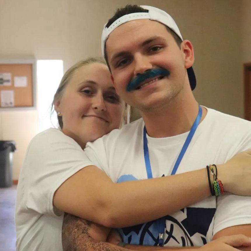 The iconic blue mustache!