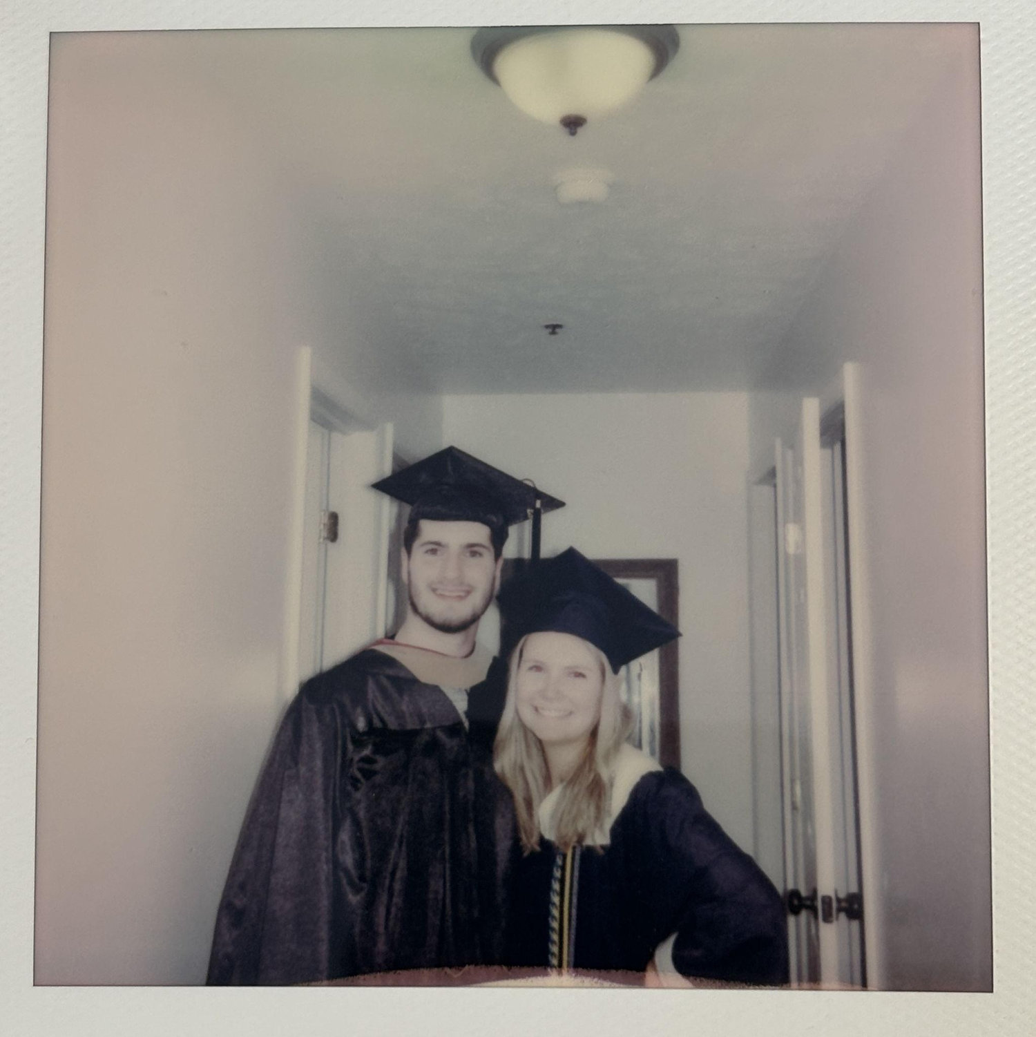 2022 - Dan and Emma graduate college. . . and say goodbye to long distance!
