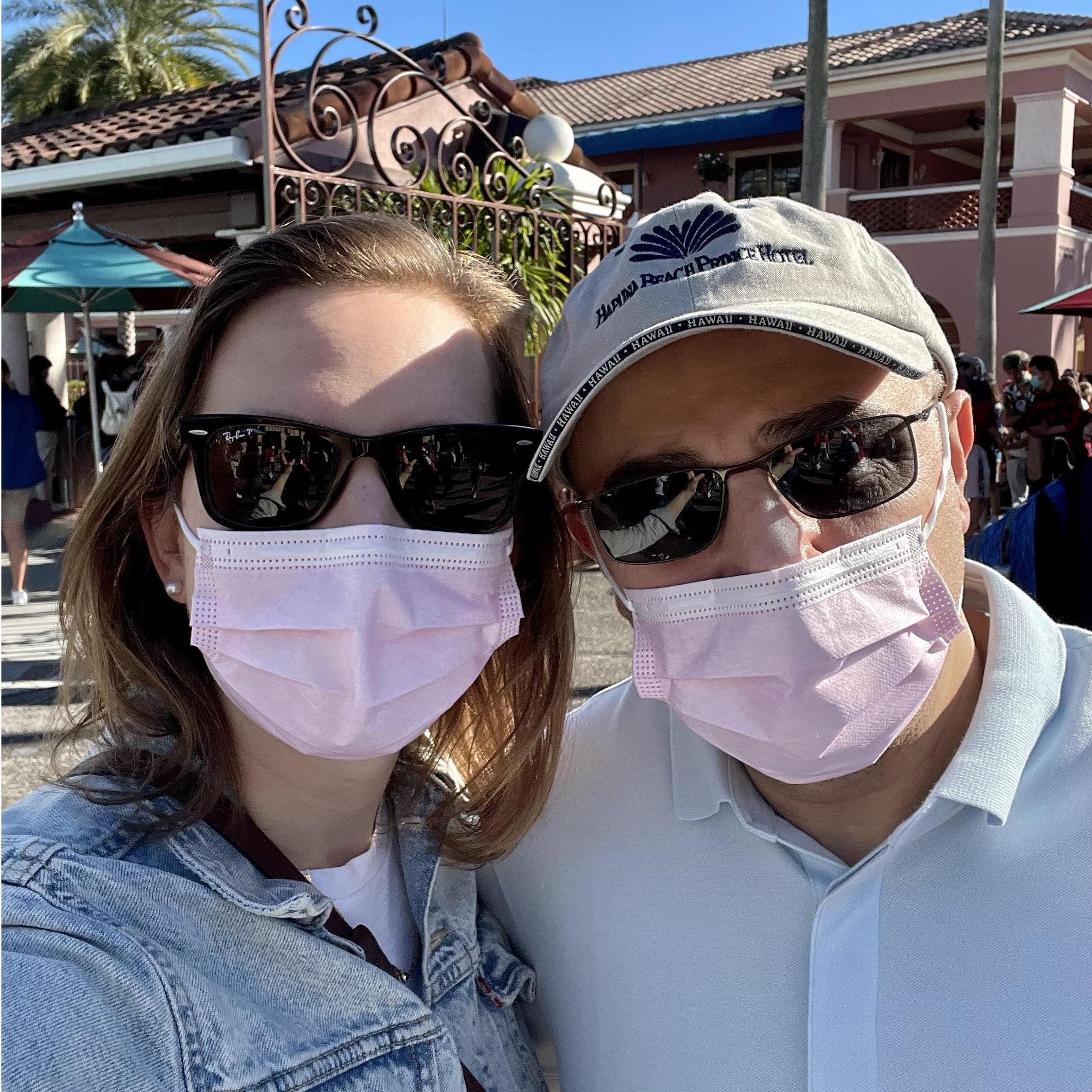 When you start dating during a pandemic, you're wearing masks in a lot of pictures together.  Disney world at Christmas