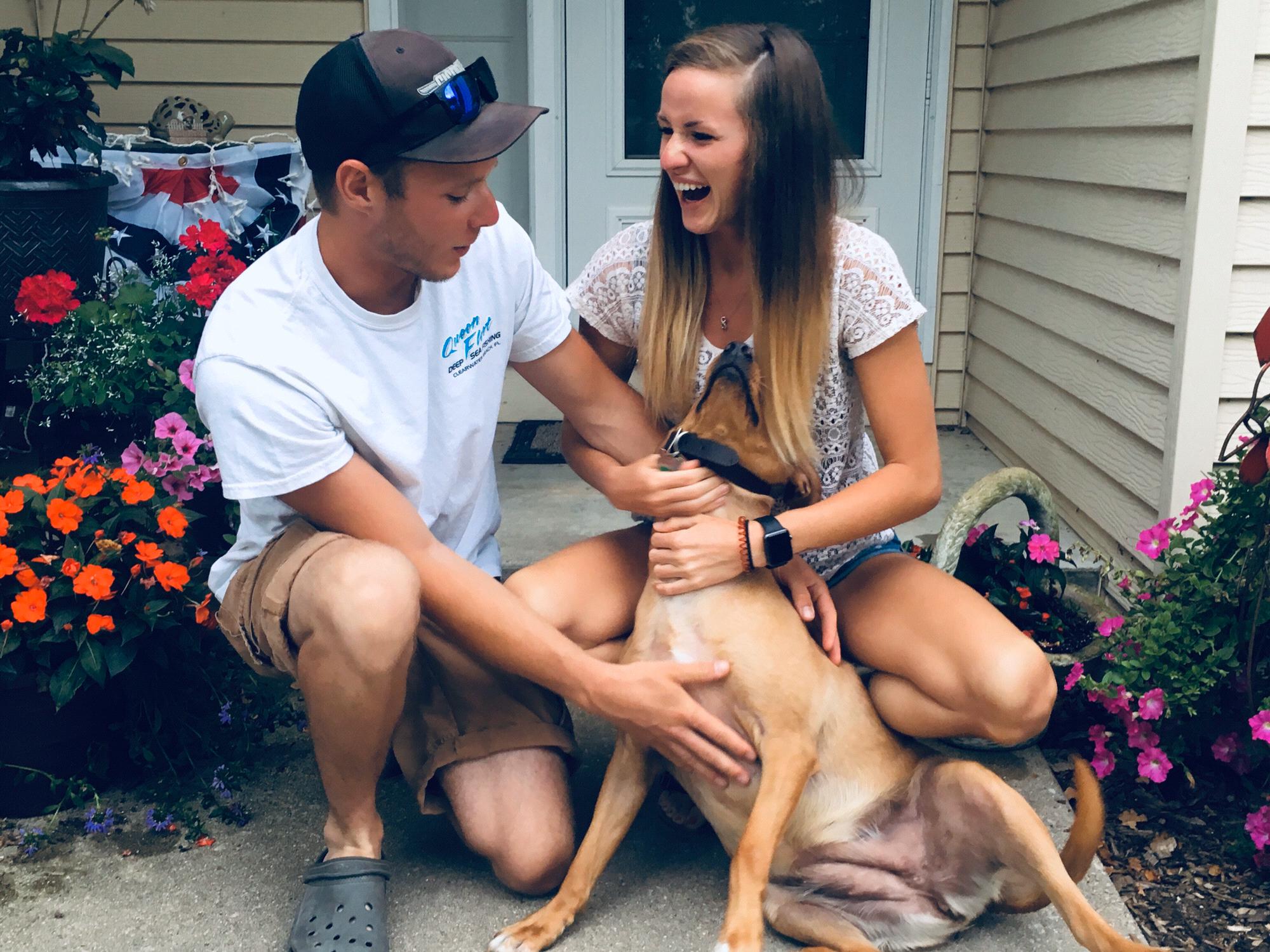 Attempting to get a picture with our favorite pup, Oakley.