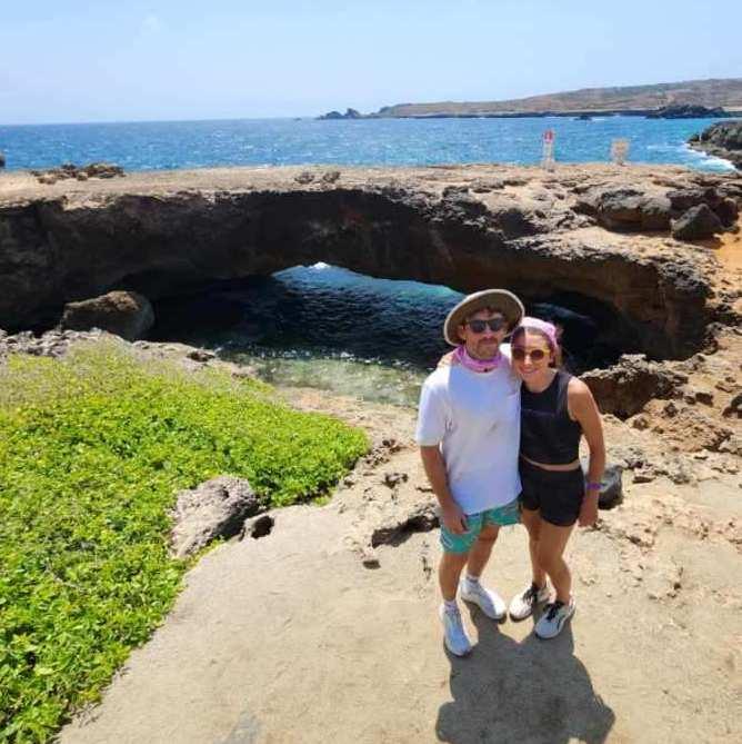 Emma let Dan wear her Yellowstone park bucket hat because she knows deep down inside that he looks better in it. Also, natural bridge in the background!