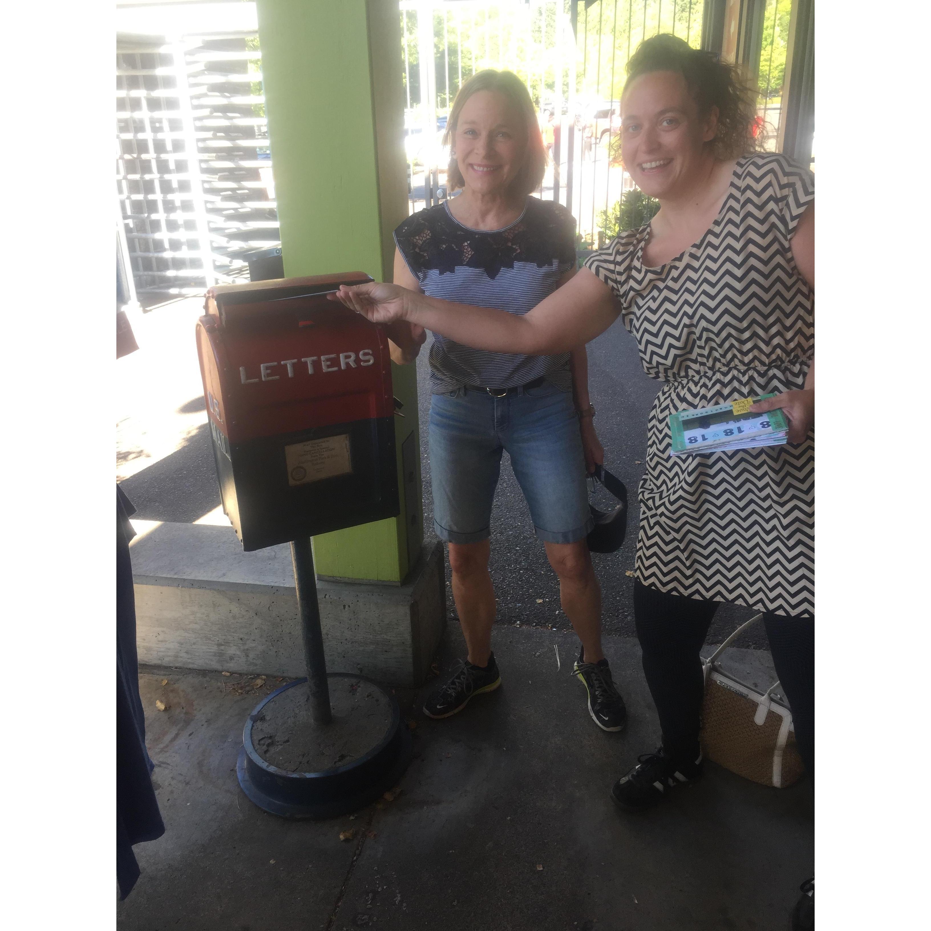 Joan and Em mailing Save the Dates from the Oregon Zoo
