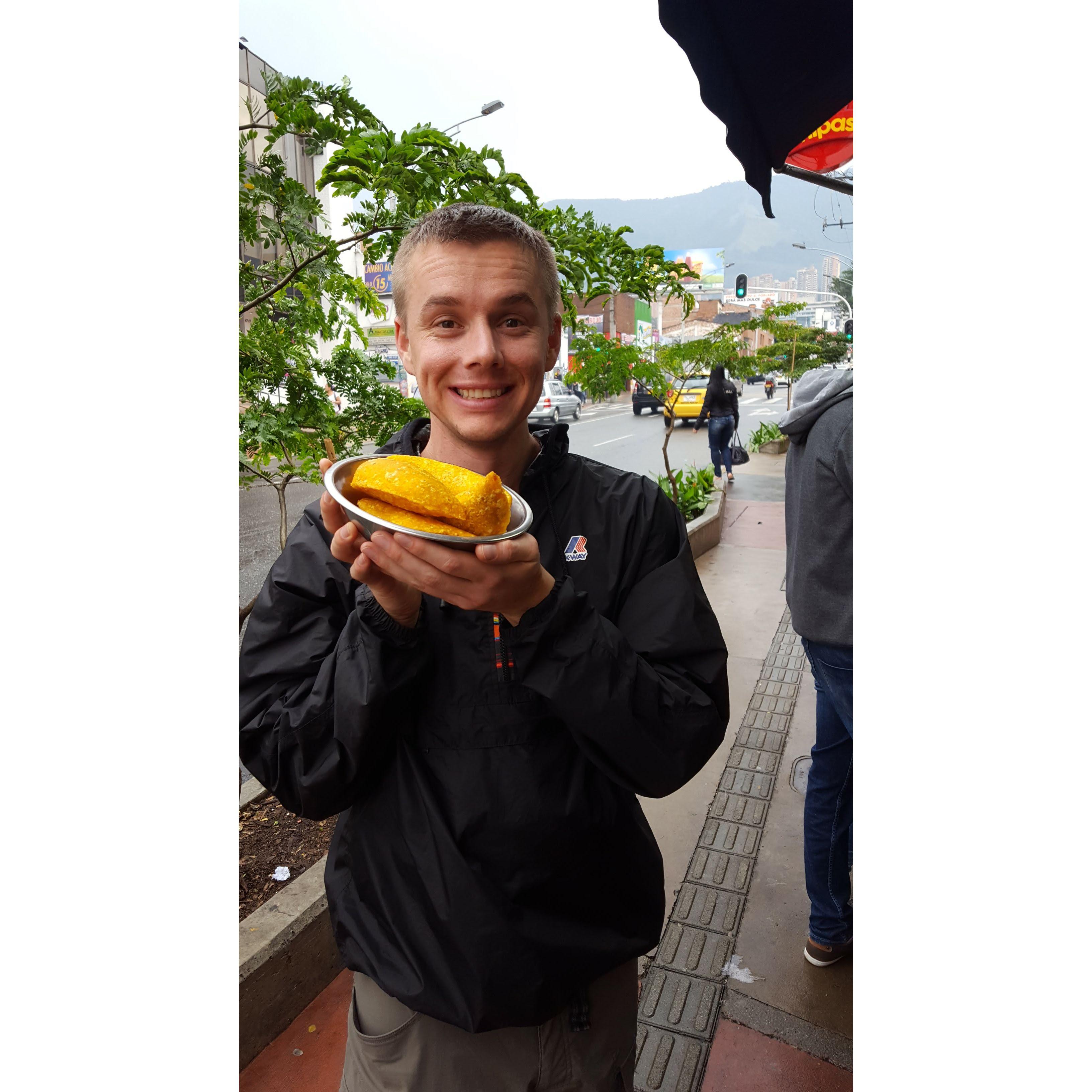 Enjoying street food in Colombia during our first trip together