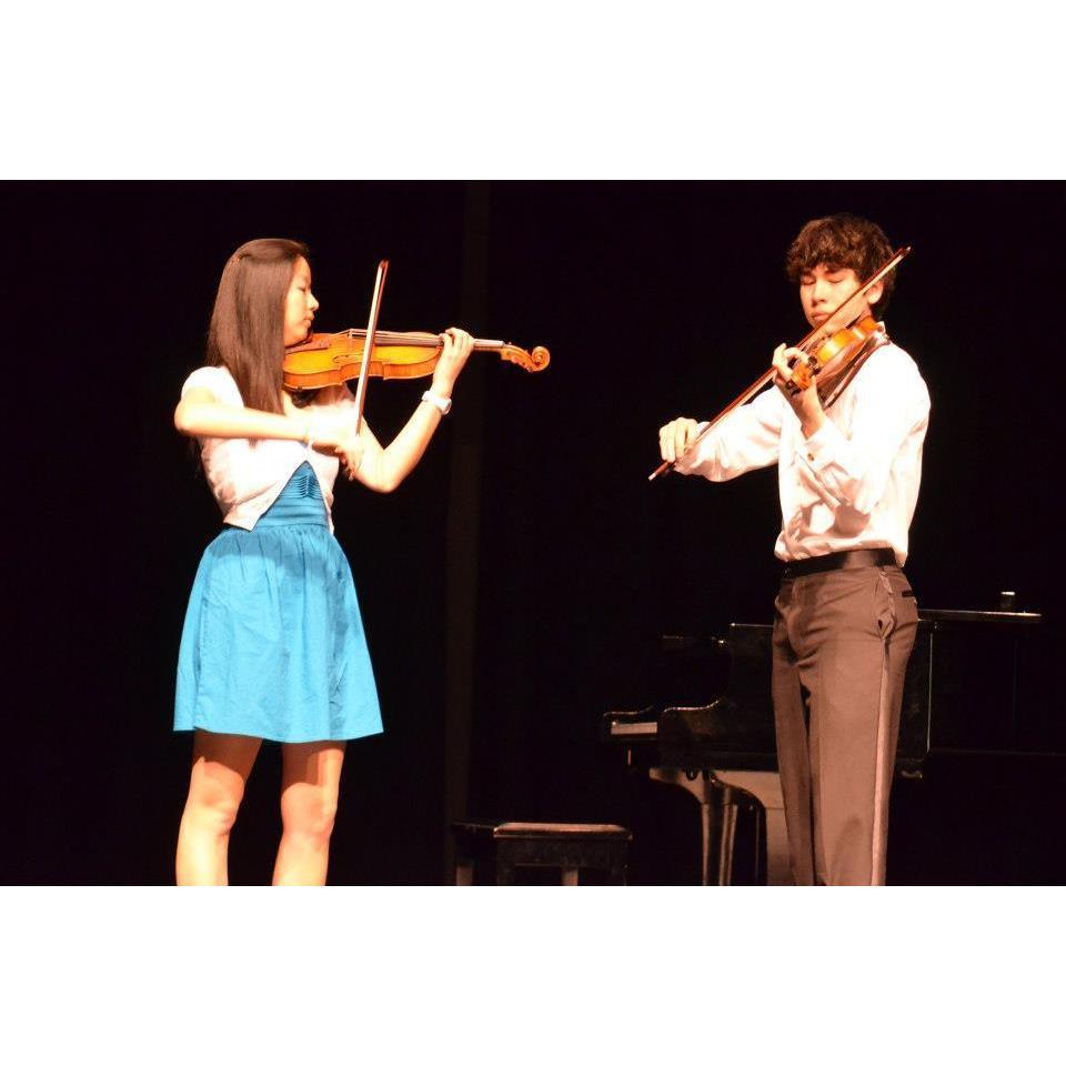 Performing together at a benefit concert at Angela's high school (March 2013)