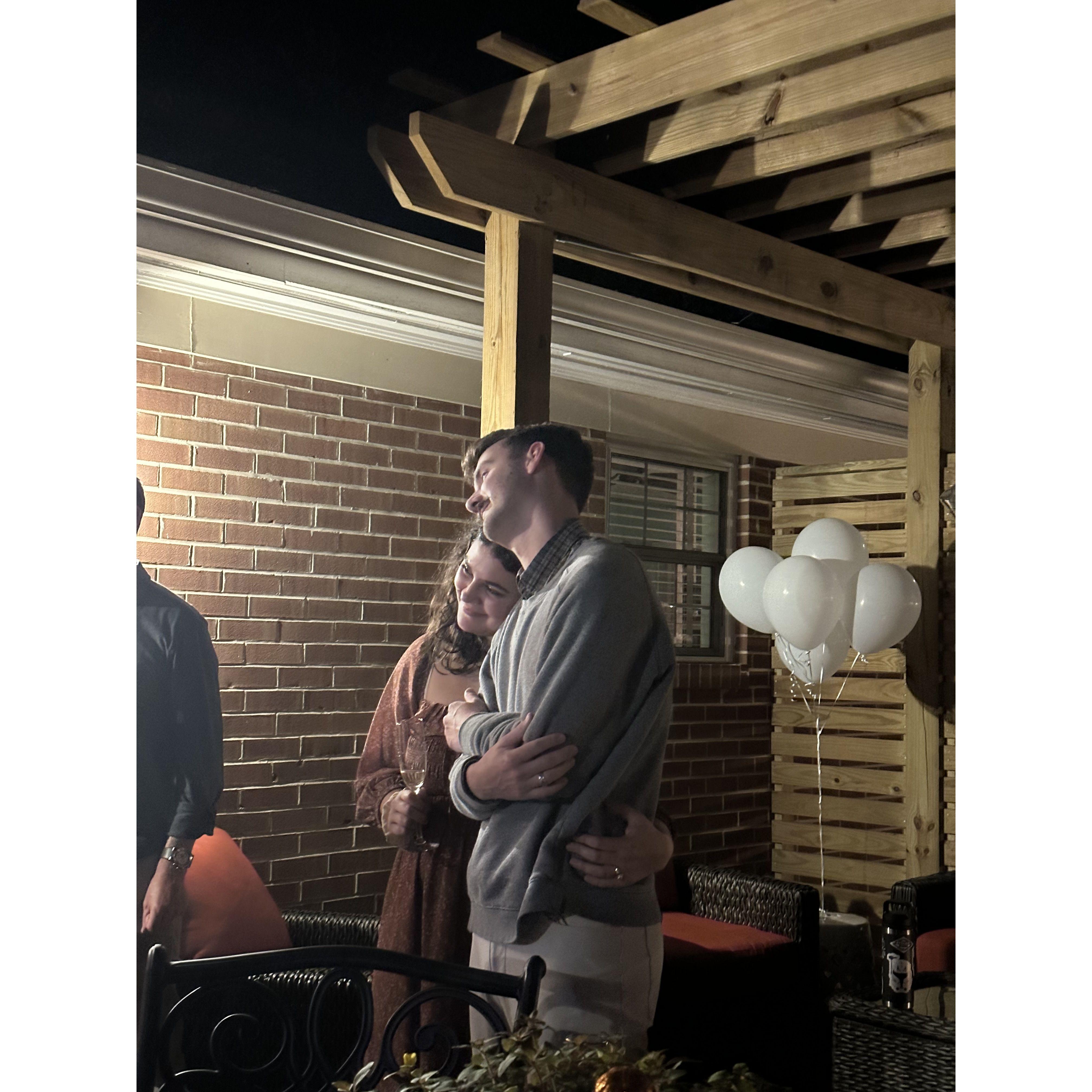 listening to speeches at our engagement party :)