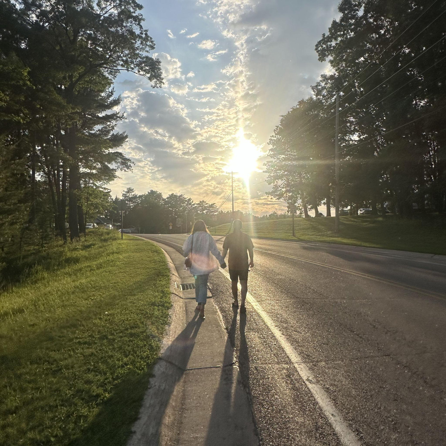 Walking to our favorite spot in Waupaca, The Wheelhouse - Summer 2025