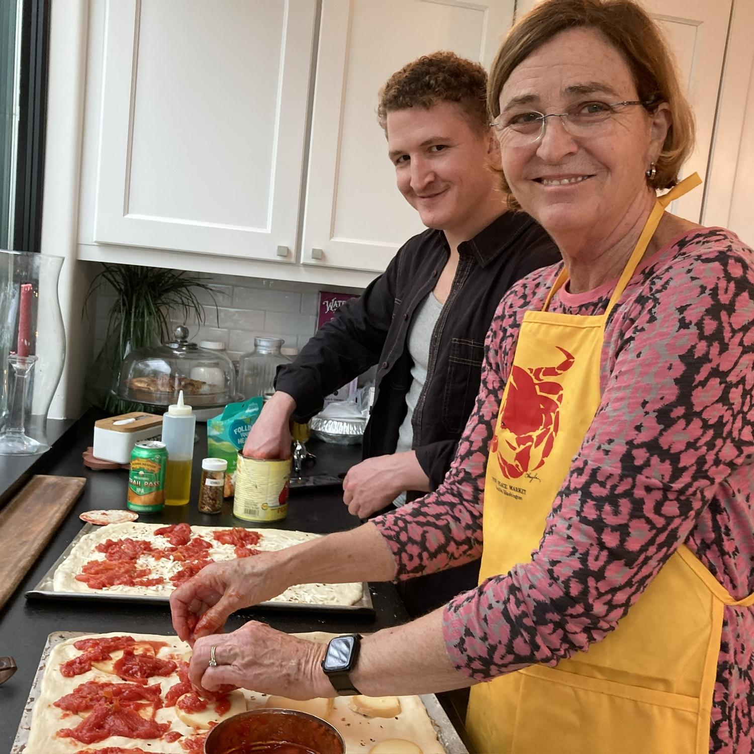 Dorothy and Ollie making pizza for Christmas Eve 🎄
