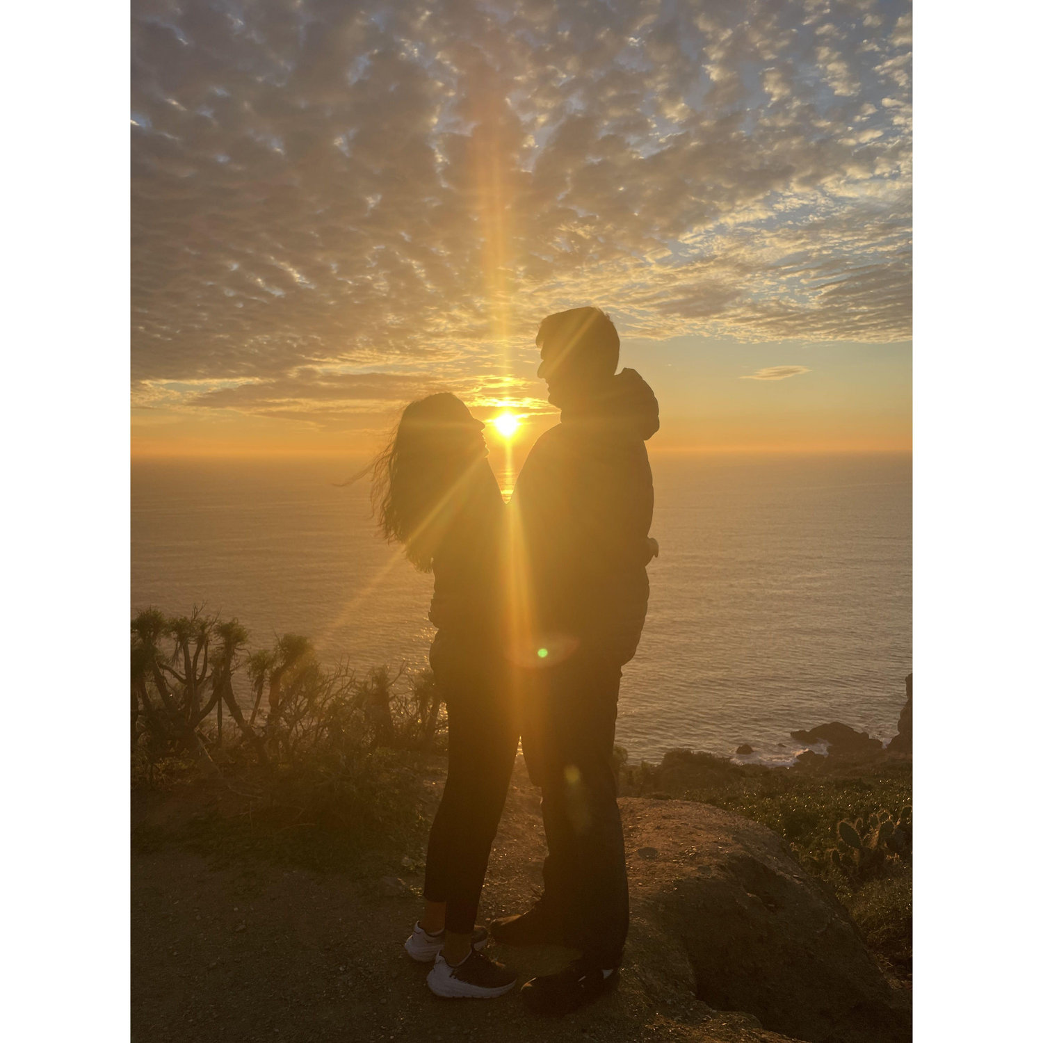 Cheesy sunset couple photo