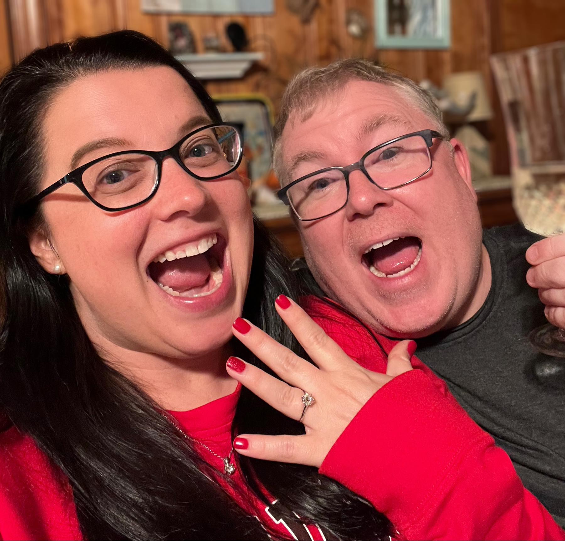 We’re engaged! Snuggled up on the couch in leggings and a sweatshirt… just the way it should be :)