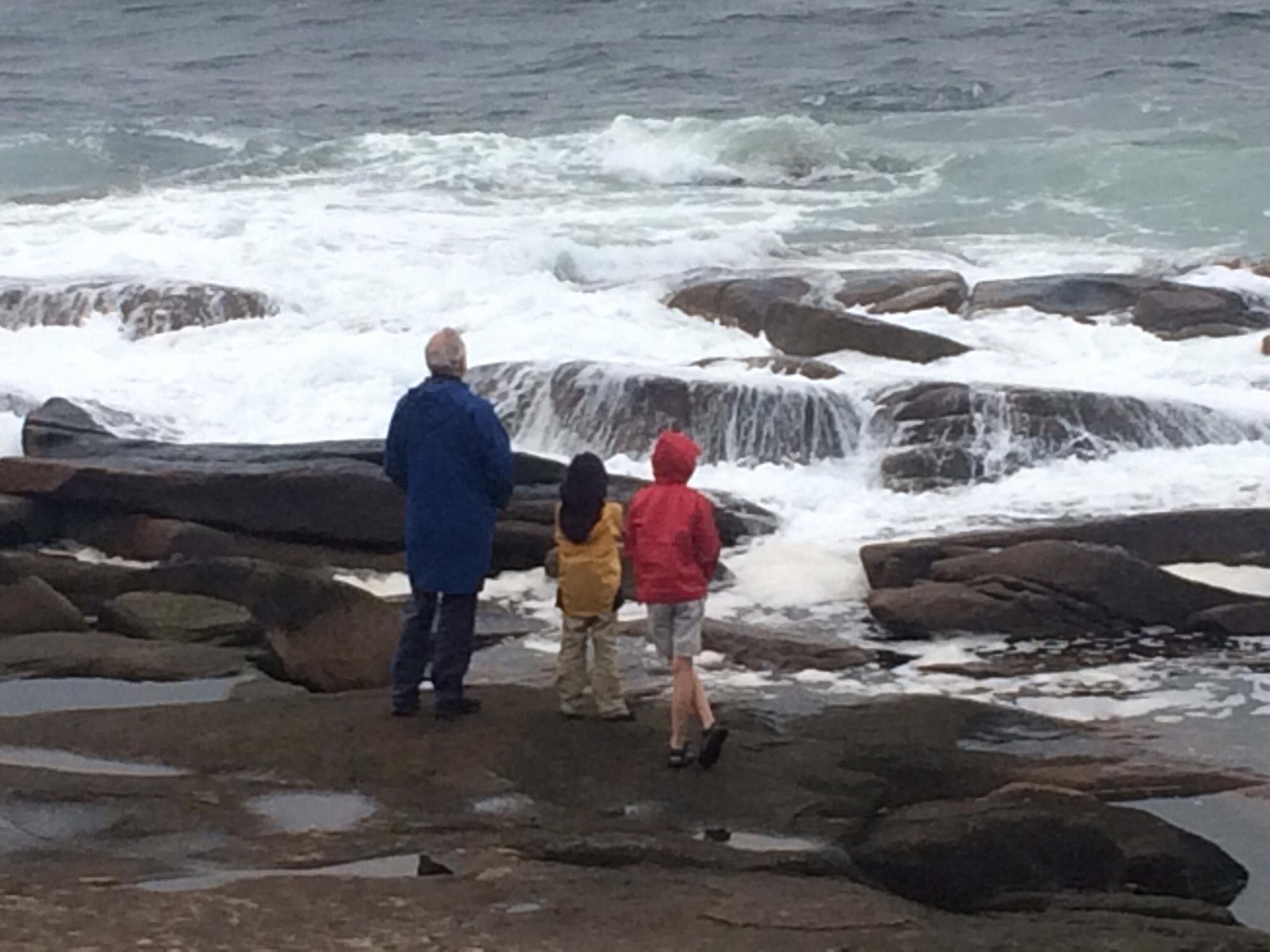 John and boys on a walk up the coast from the summer house