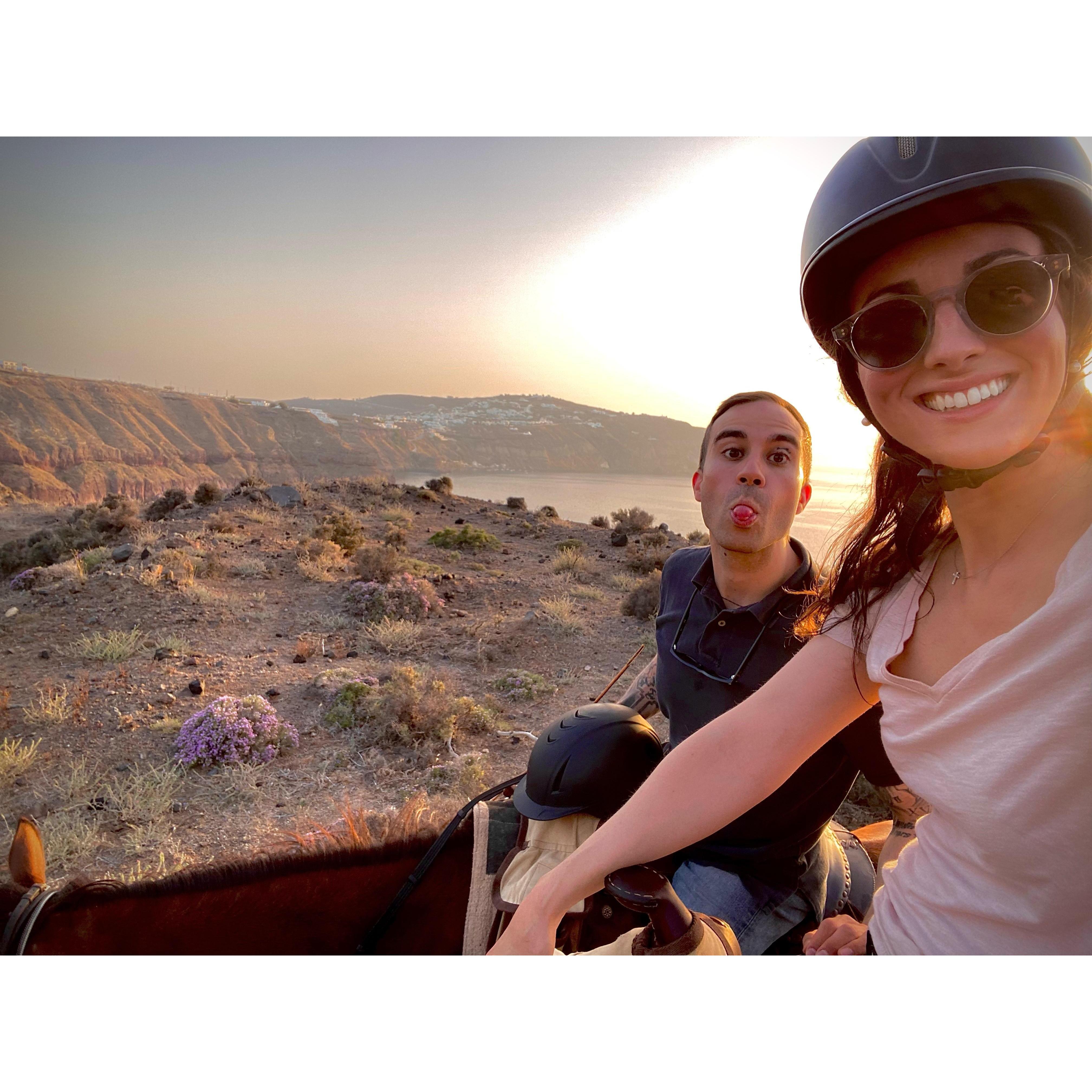 Sunset horseback ride in Santorini.