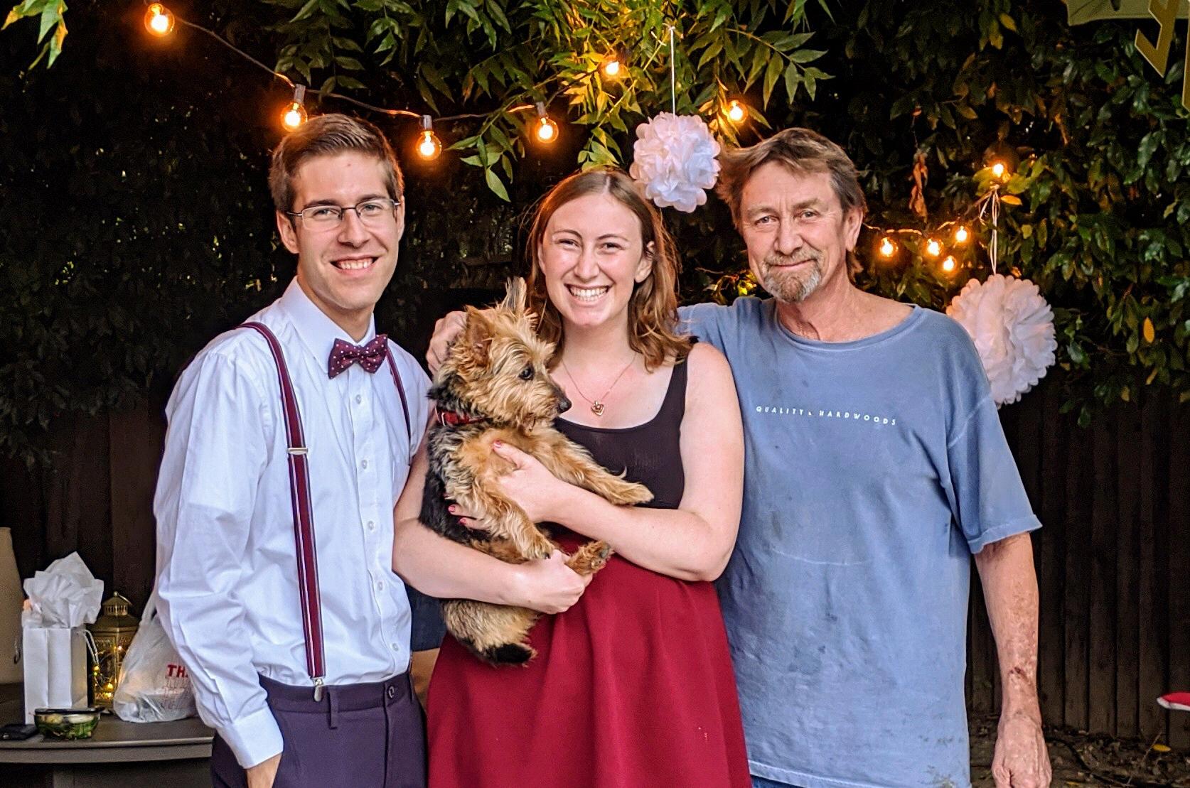 Celebrating our engagement with Jessica’s dad and dog, Penny.
