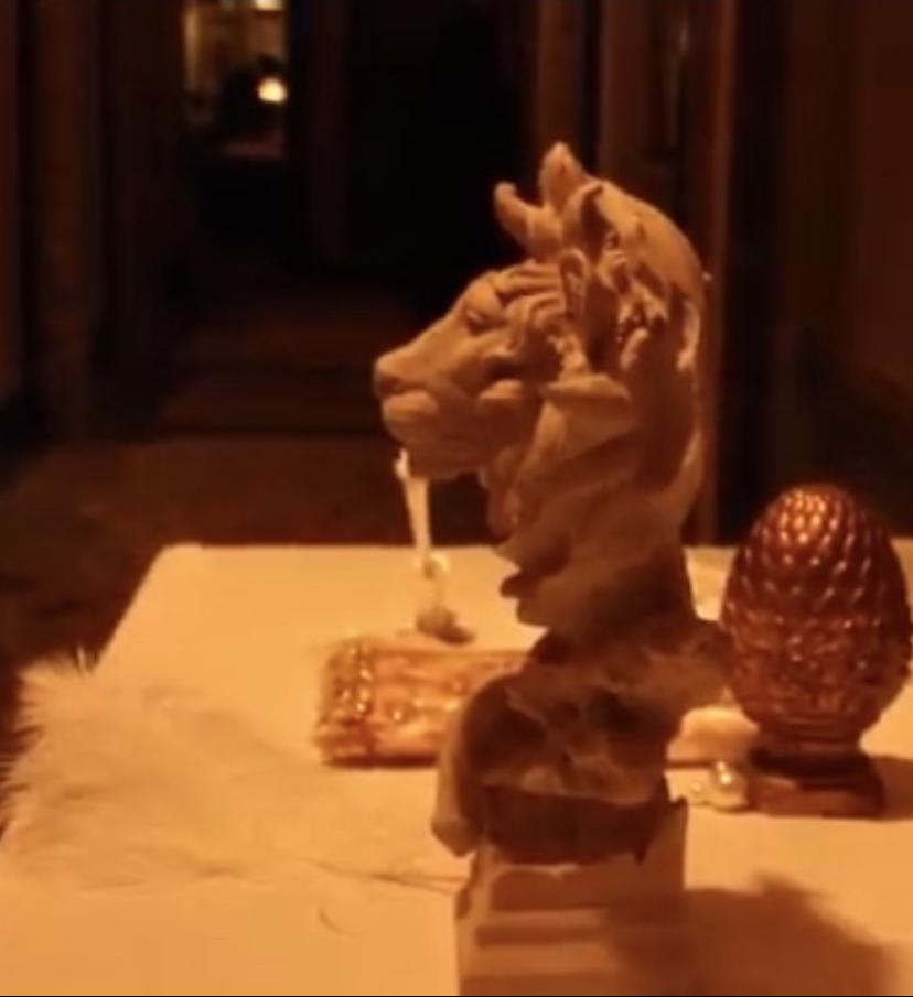 LOOYAR sandstone lion sculpture and vintage Syroco wood artichokes