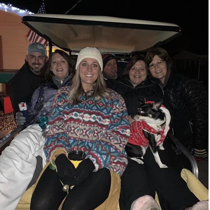 Might have exceeded the golf cart's capacity, but this is the only way to go caroling.