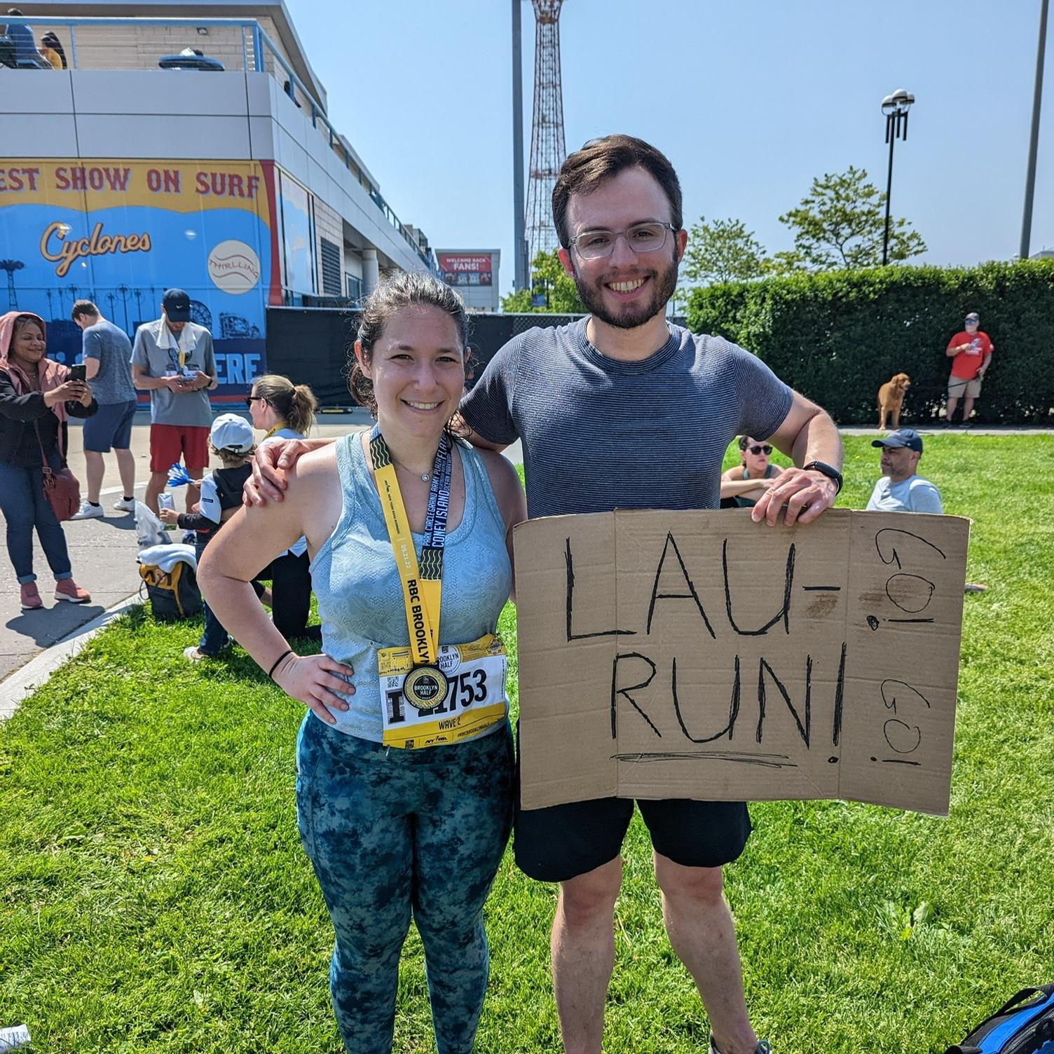 Jon cheering on Lauren during her first half marathon.