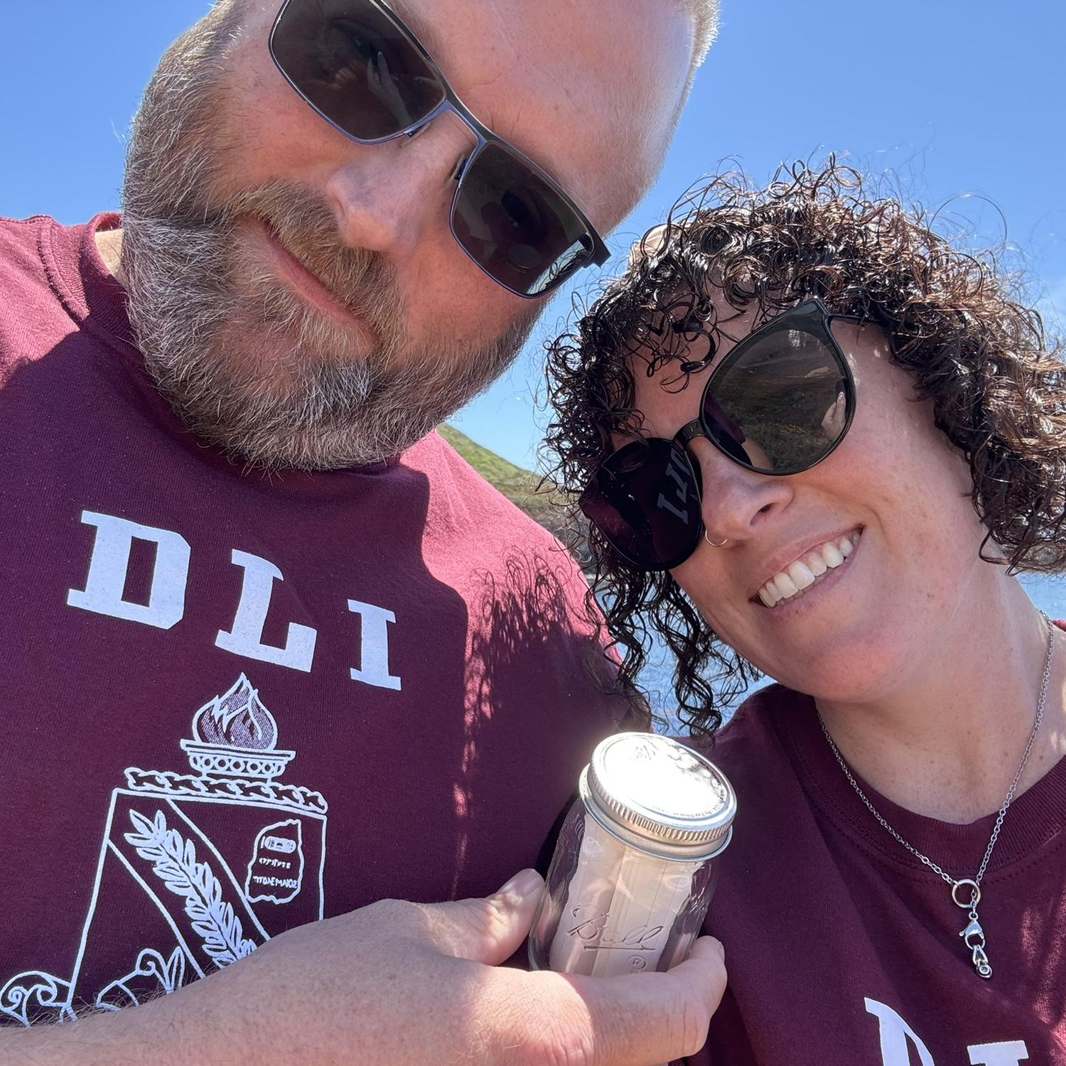 Matching t-shirts (because that's how we roll!) while putting a message in a bottle out into the Pacific Ocean to spread our good luck to others looking for love!