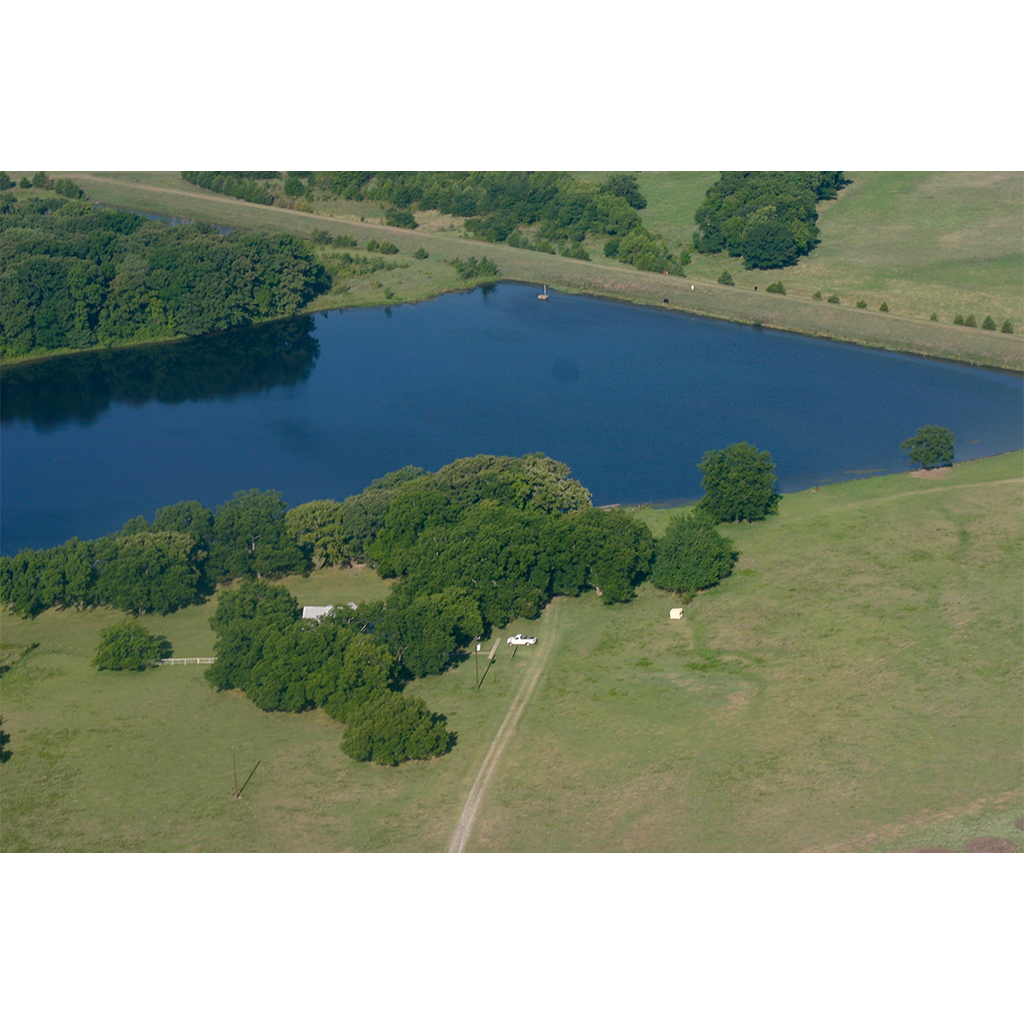 Drone shot of the lake front property.