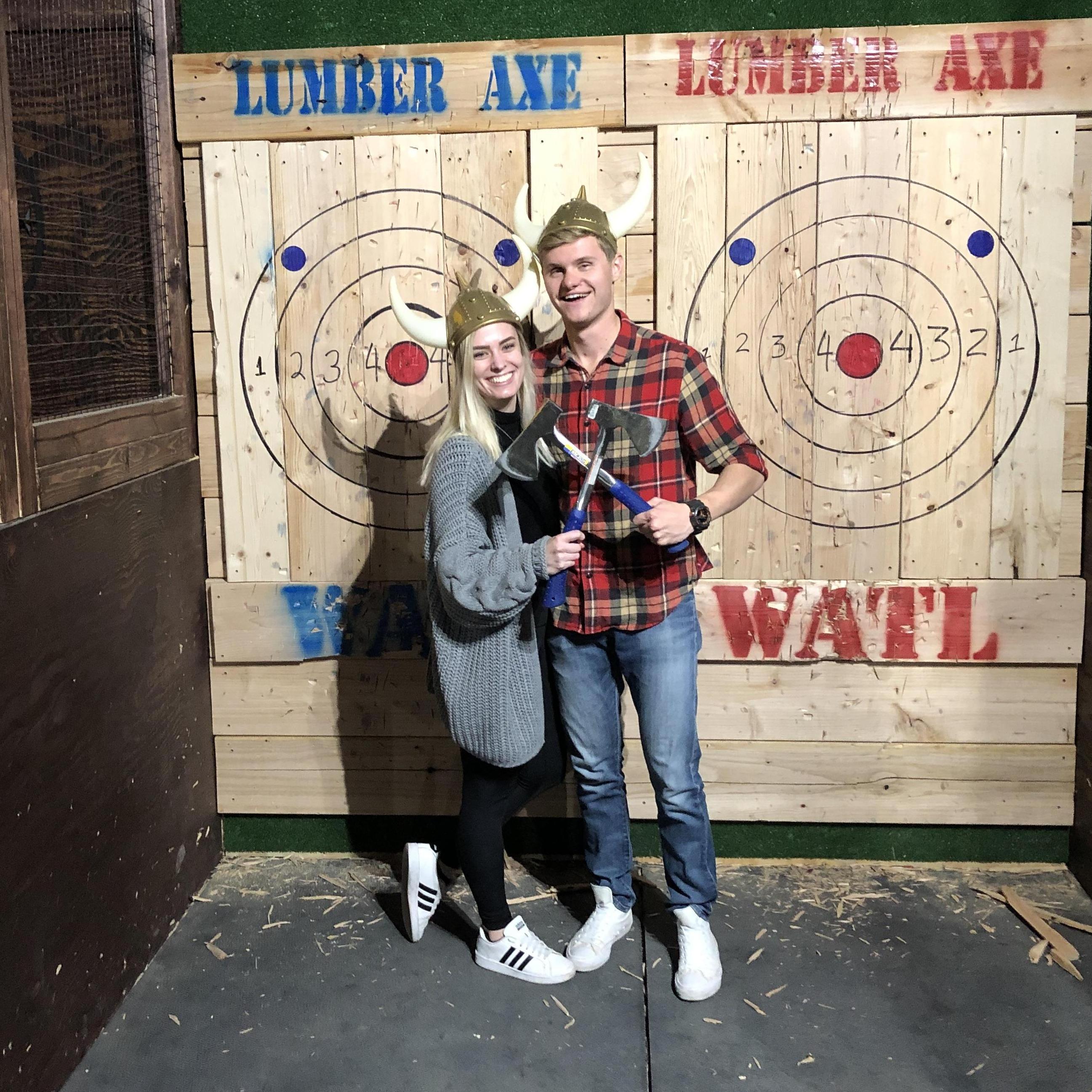 First time axe throwing, something that would become a favorite tradition for the couple! (DSM Escape Chambers - 2018)