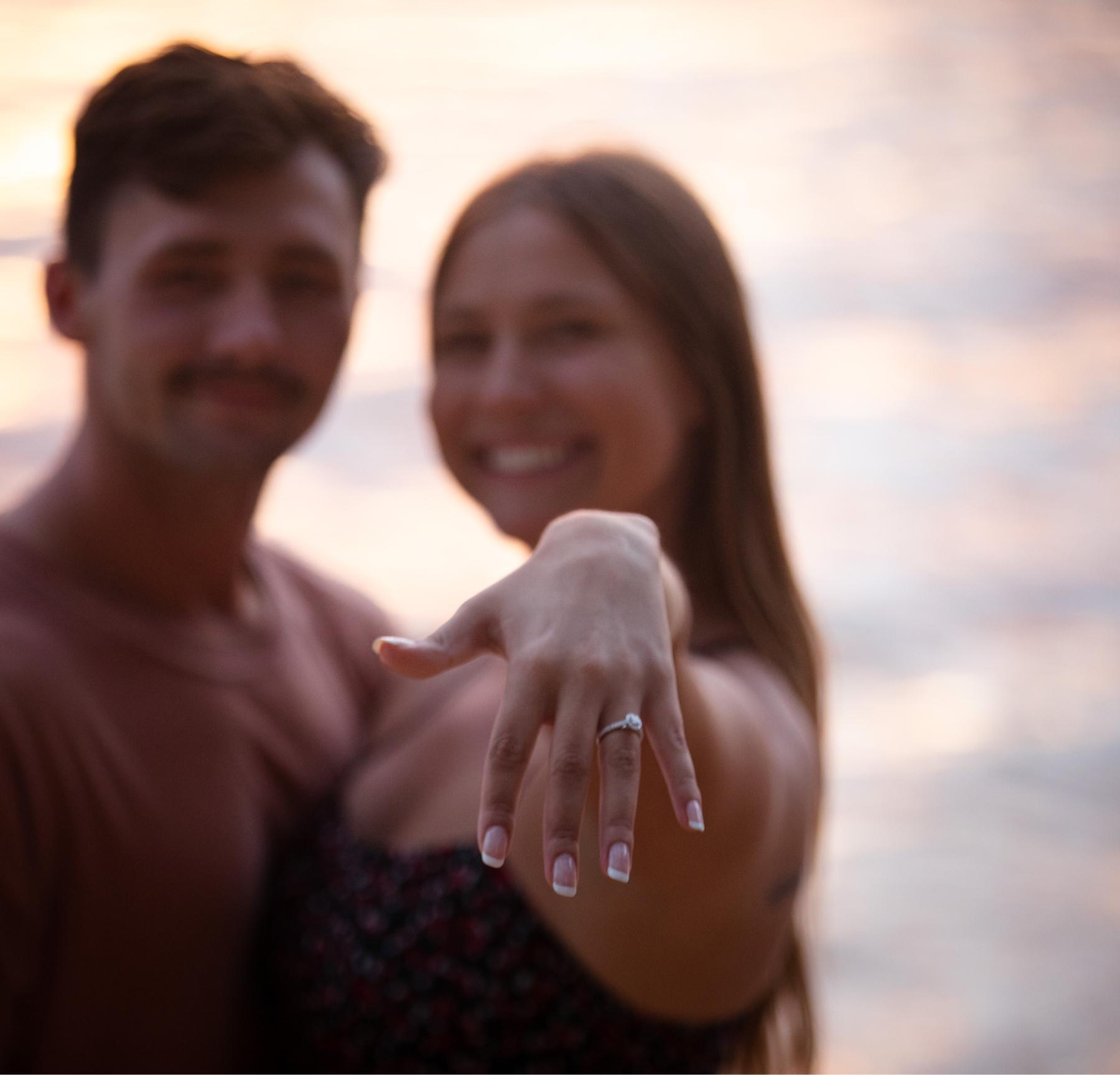 Showing off the perfect ring Israel picked out