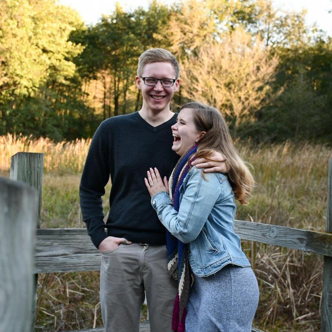 Laughing at something silly while taking engagement photos right after he proposed!