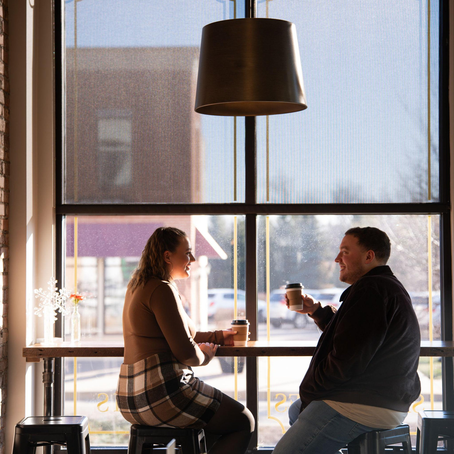 In our favorite local coffee shop that let us take some engagement photos, Lincoln House in Huntley, IL