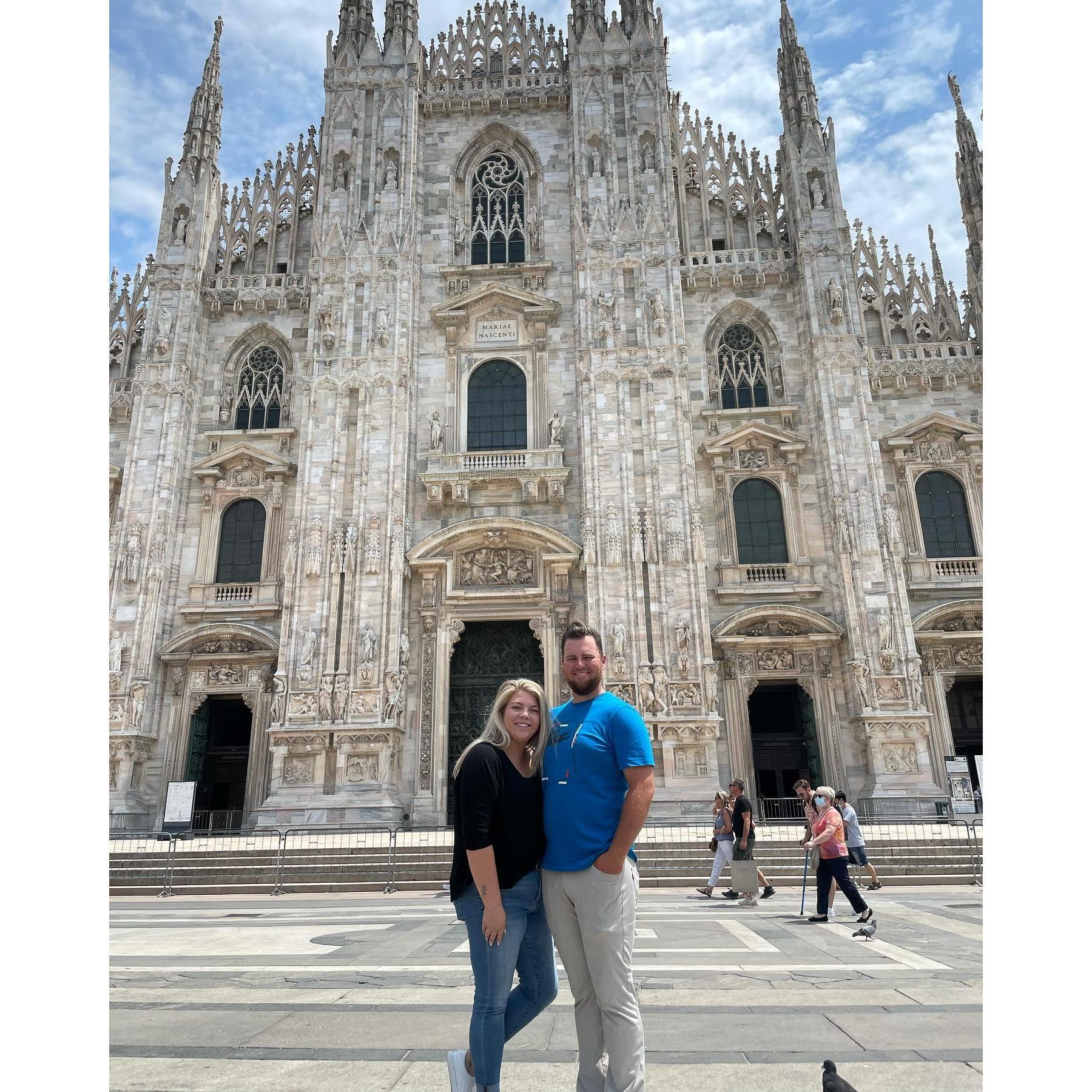 The two lovebirds in front of the world's 3rd biggest cathedral, il Duomo in Milan, Italy!
