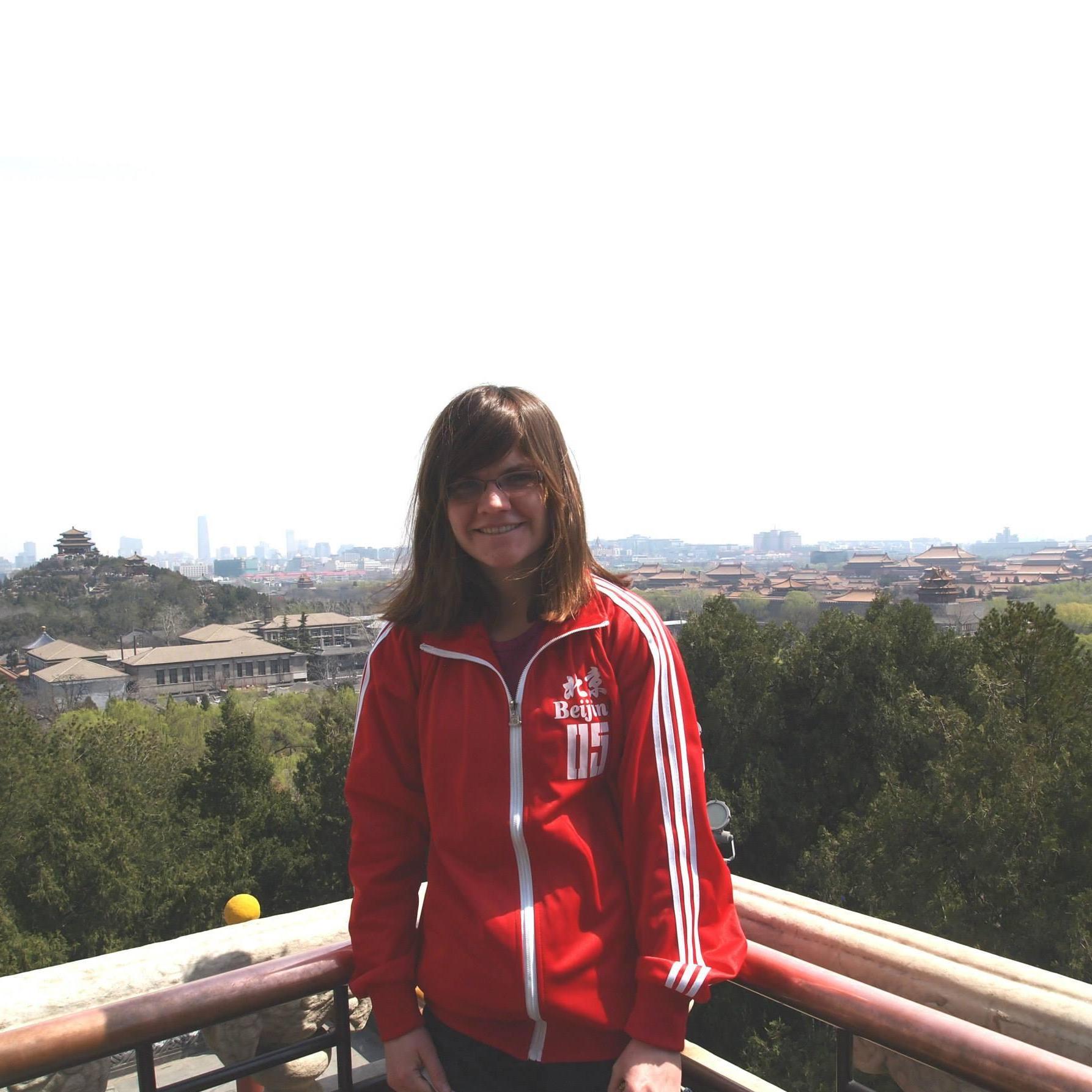 Taken in Beihai (North Sea) Park in Beijing. The Forbidden City is on the right, and a park temple is on the left.
