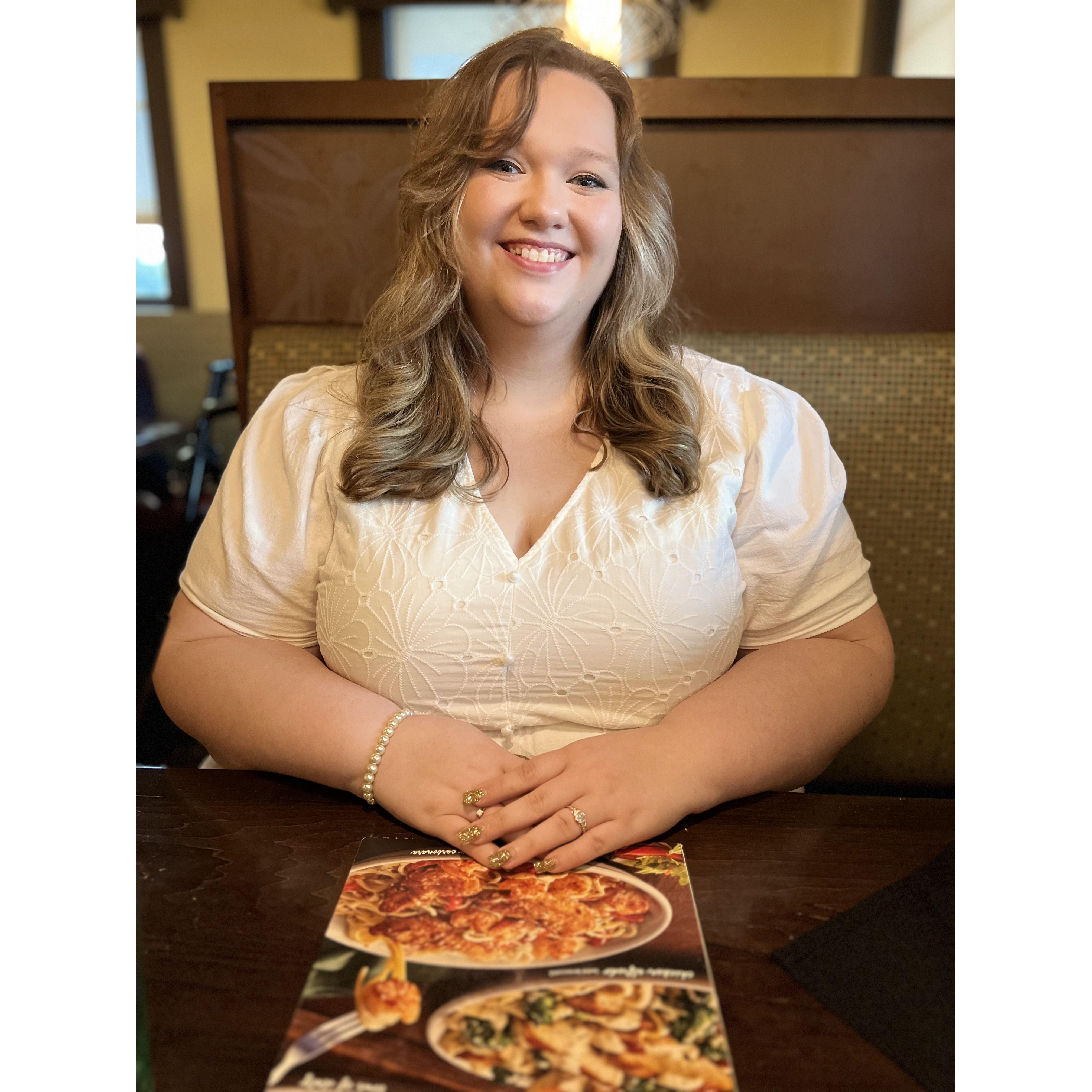 Charles took a picture of me on our date after our engagement photos!