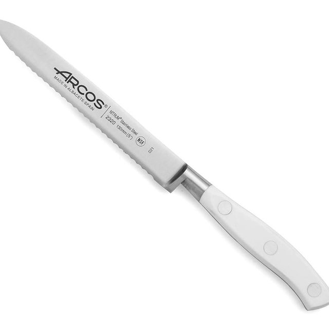 Arcos Forged Knife Serrated 5 Inch Nitrum Stainless Steel and 130 mm blade. Ergonomic Polyoxymethylene POM Handle. Series Riviera Blanc. Color White