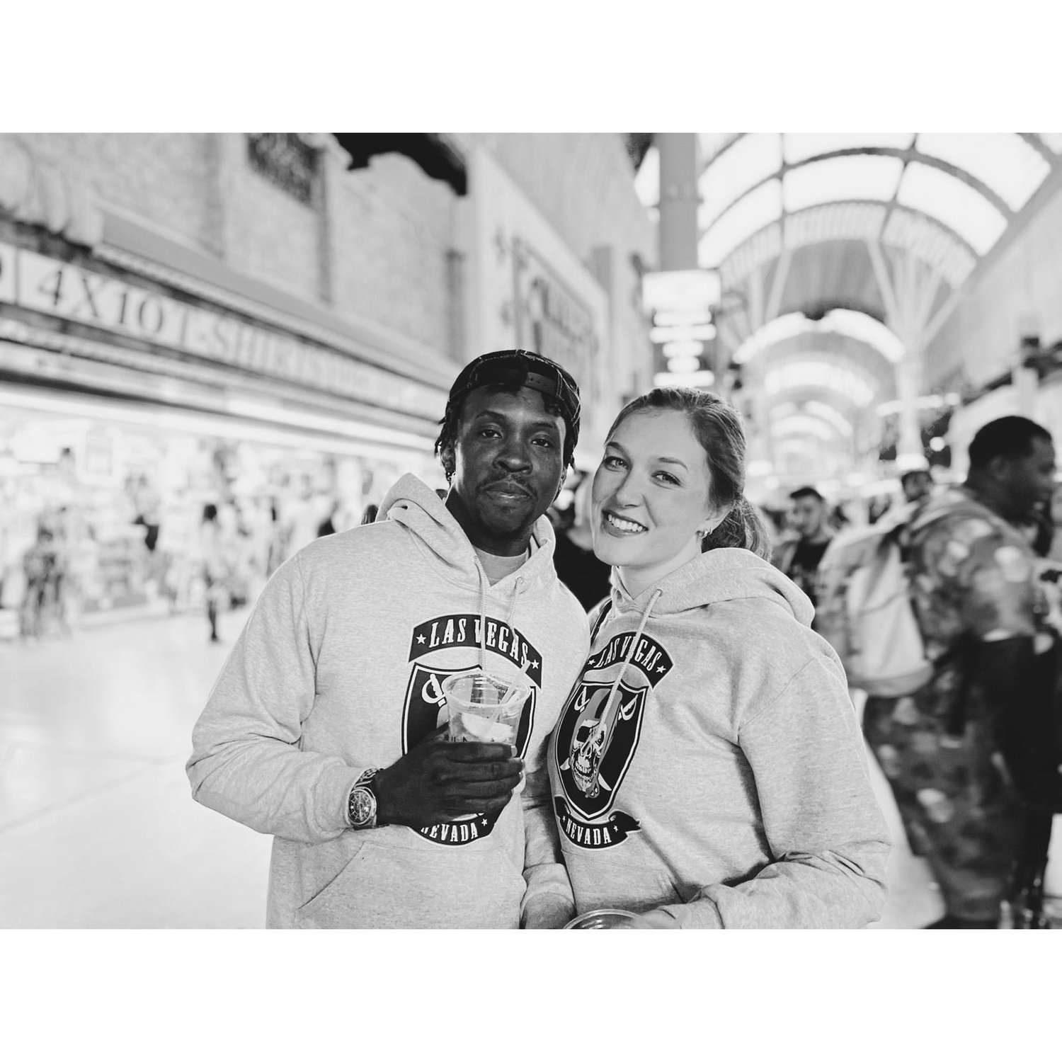 We bought these matching sweatshirts because we were cold, but now everyone thinks we are Raiders fans! Our true loyalty lies with the Vikings.