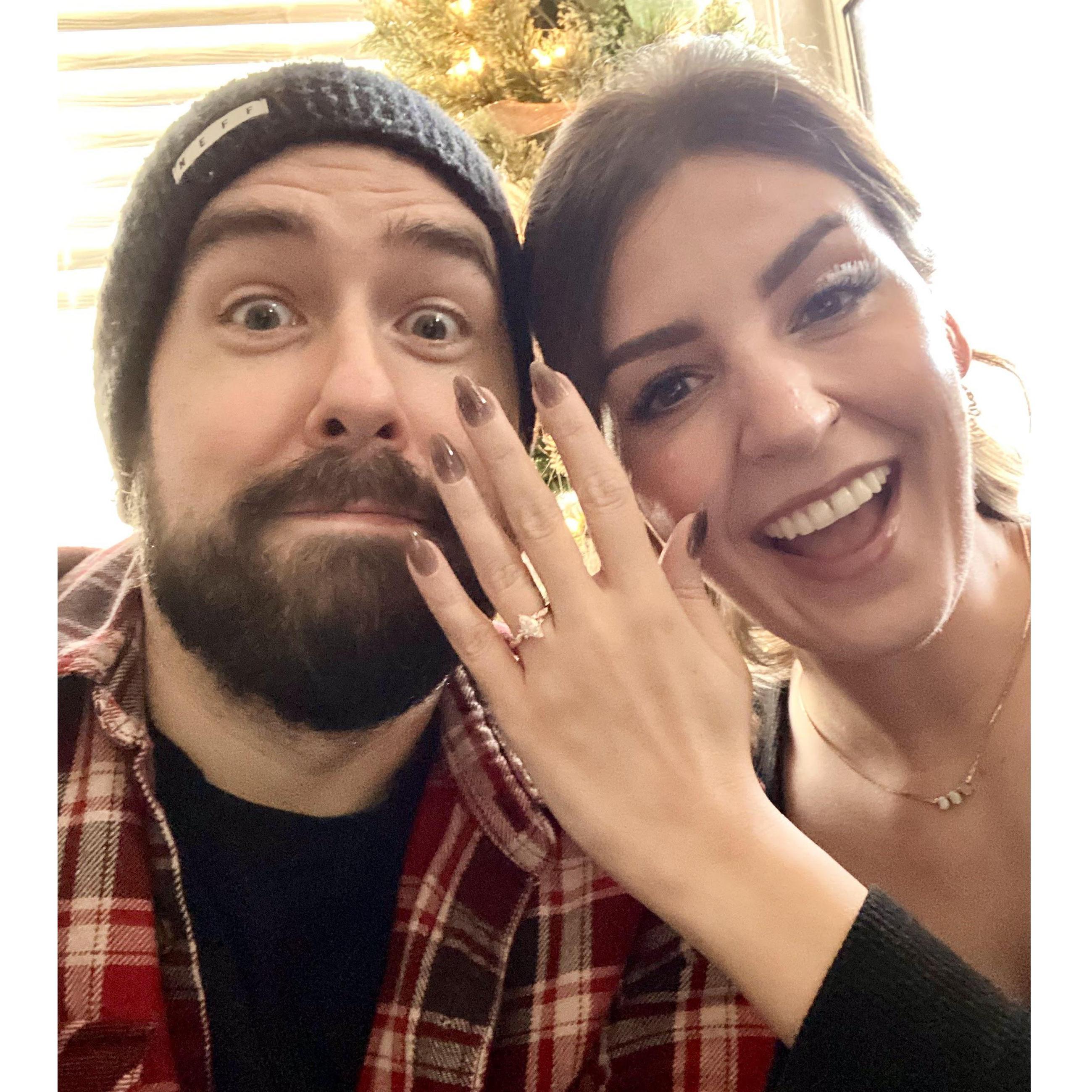 The photo we sent to family and friends to share our big news, circa January 2024!