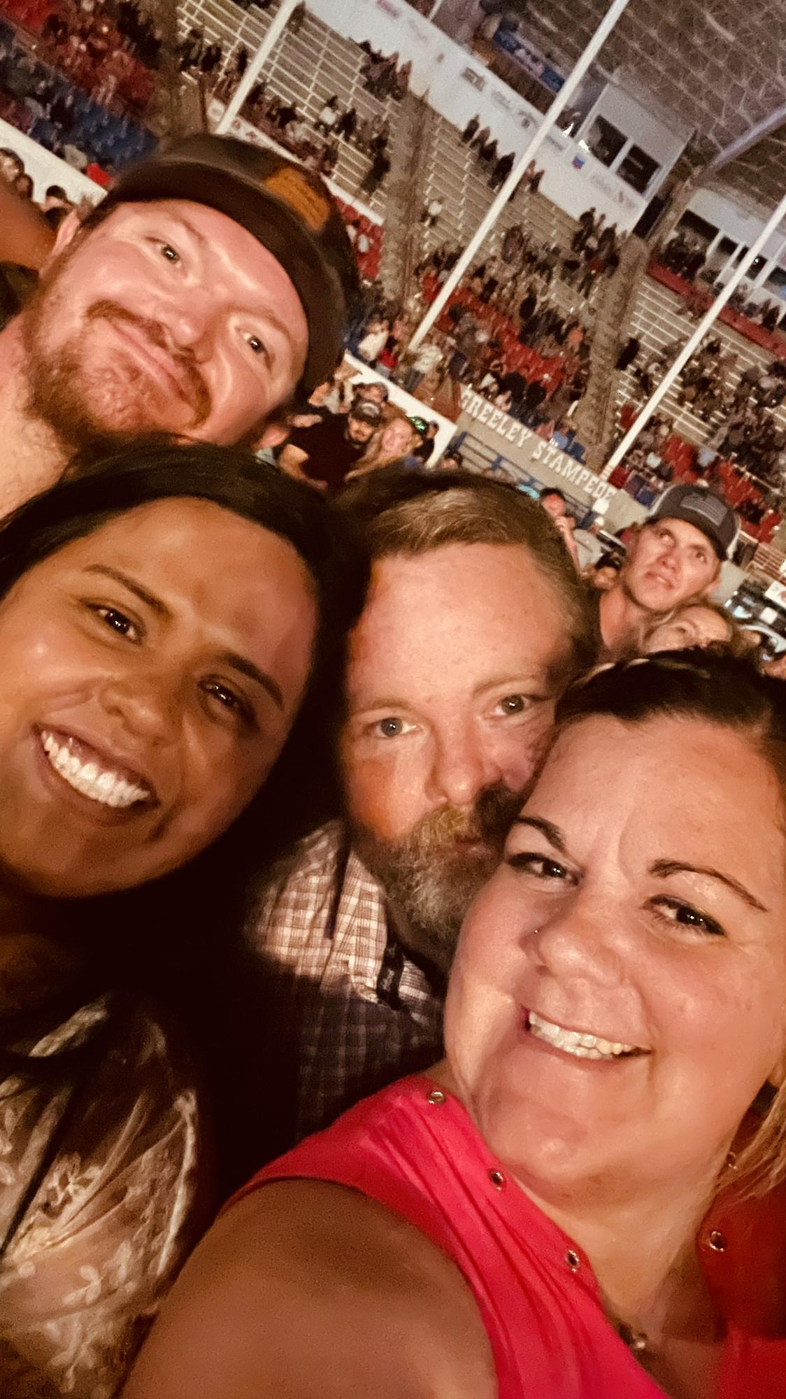 Seeing Jon Pardi and Niko Moon, in the middle of a down pour rain, at Greeley Stampede, with our Friends Chance and Gloria