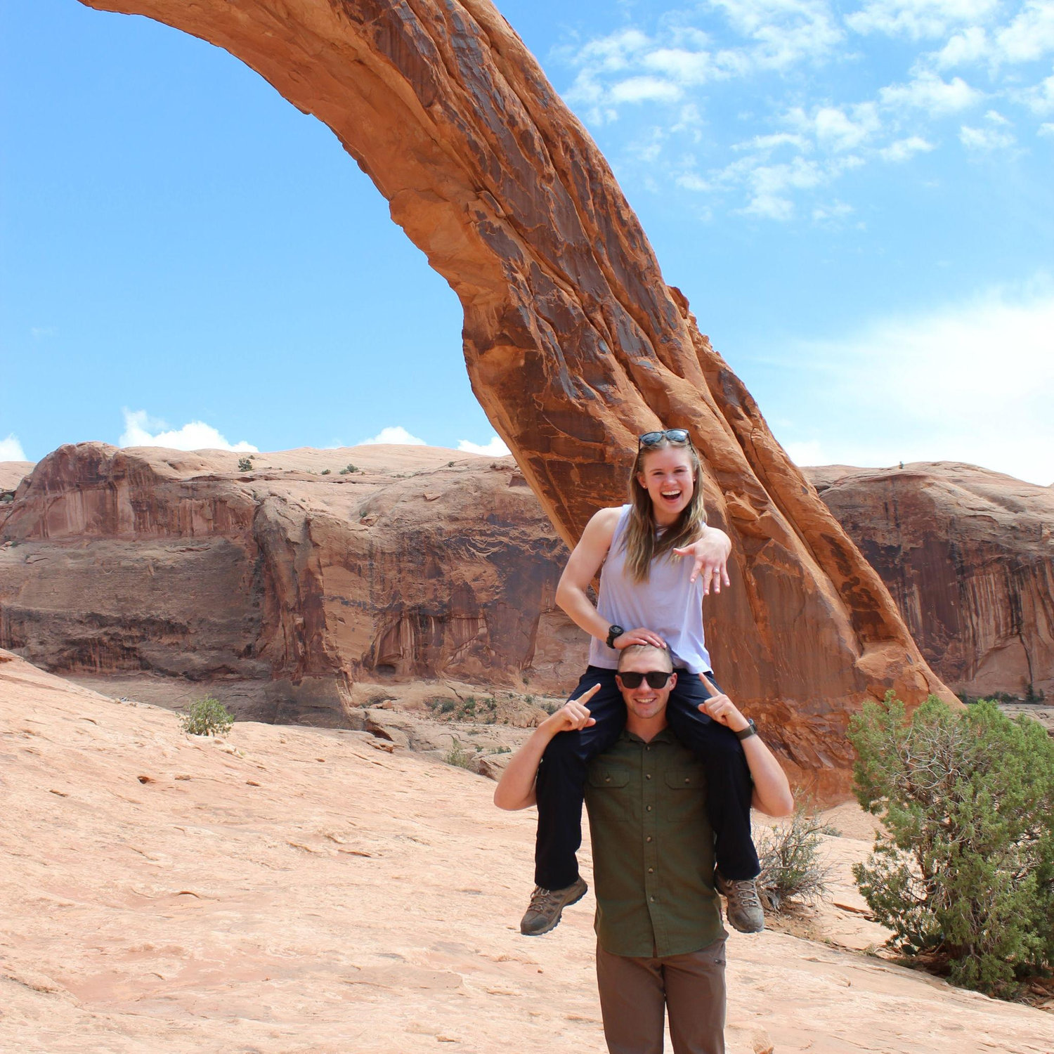 Photos our best friend Grace took of us after Logan proposed in Moab, Utah!