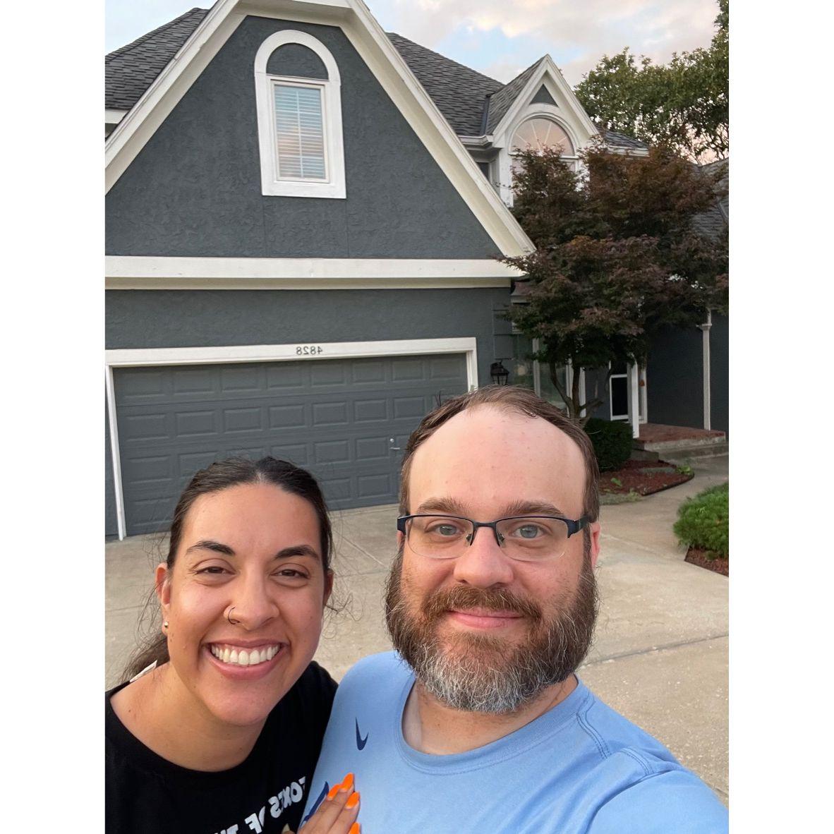 Our first selfie in front of our new house July 2023