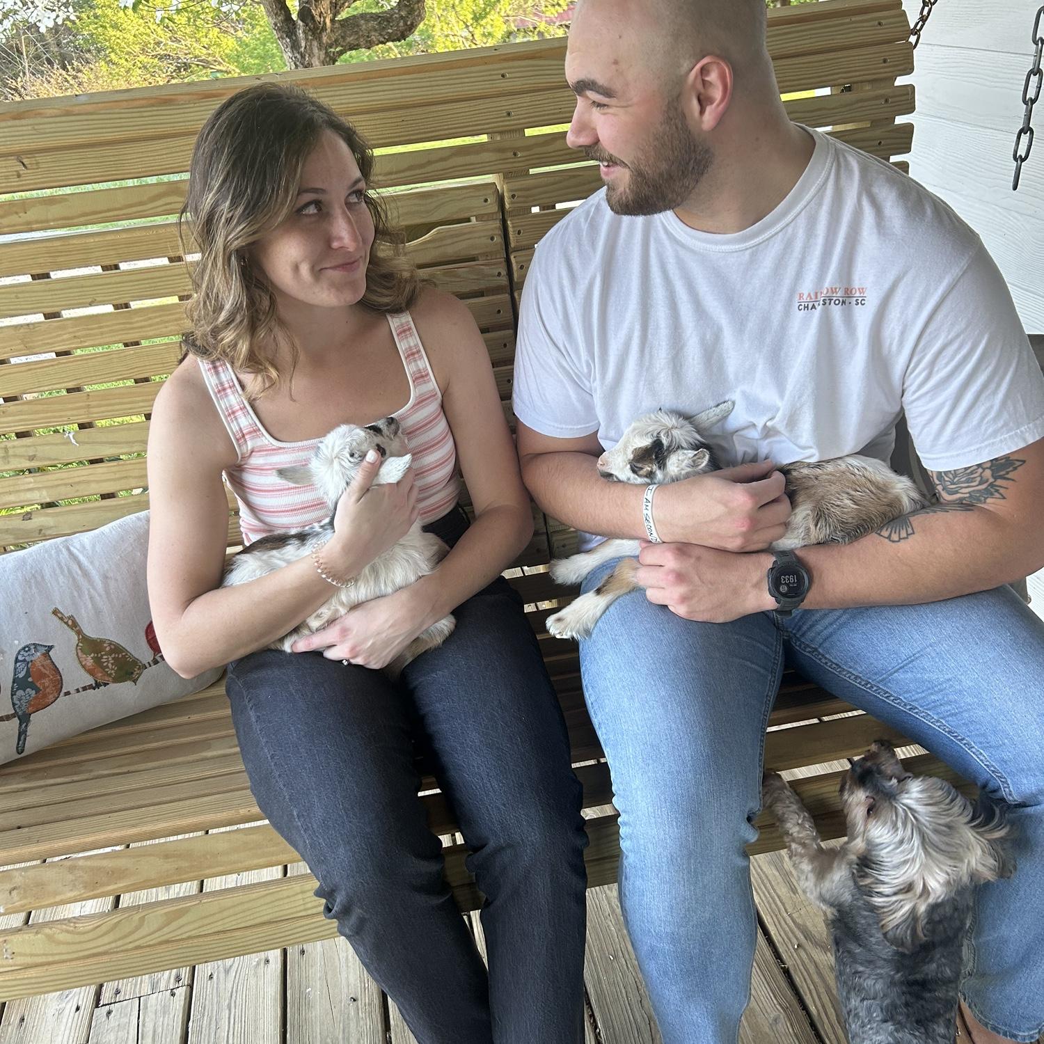 Nathan and Morgan with their kids at Hidden Creek Farm! Morgan, of course, cried the whole time they held them.