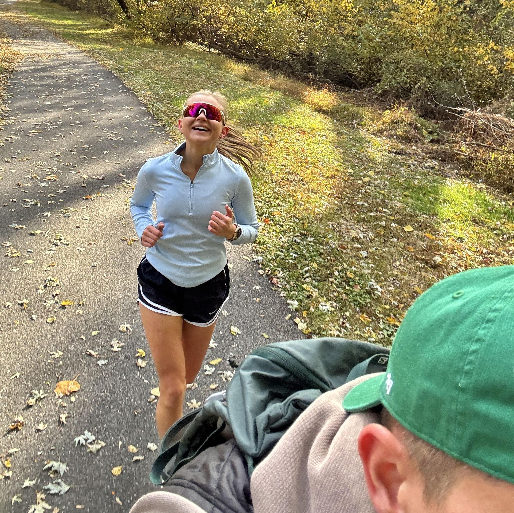 Tim biking and supporting while Alona ran her second half marathon