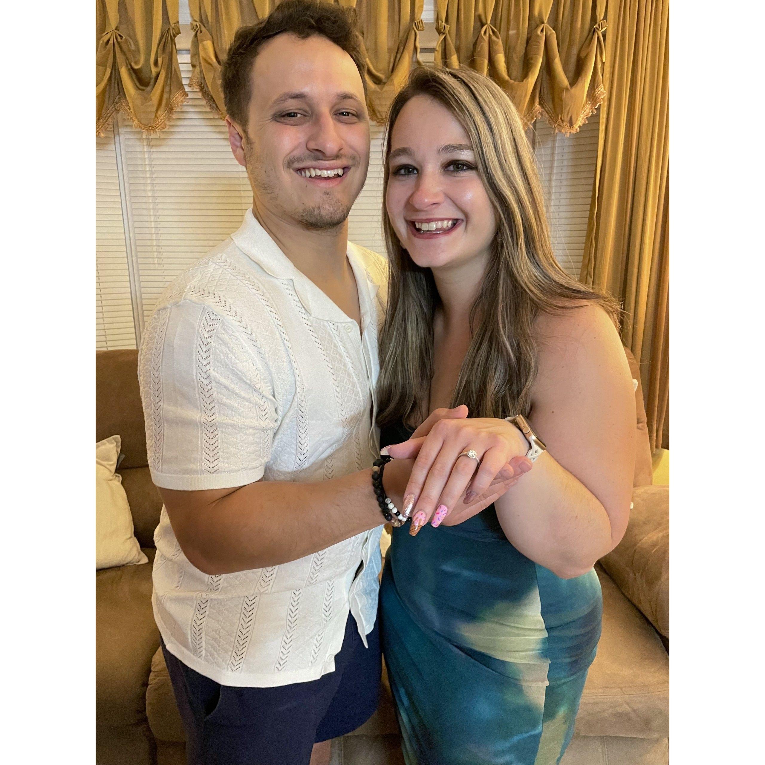 Right after our engagement, showing off the ring