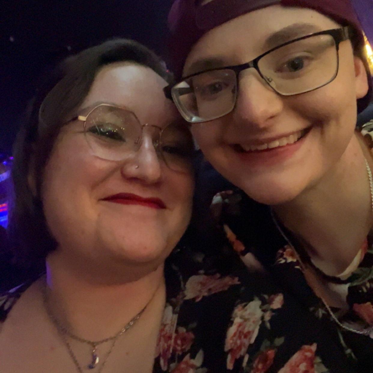 Our first night out with friends at the bar. Wearing matching shirts (of course).