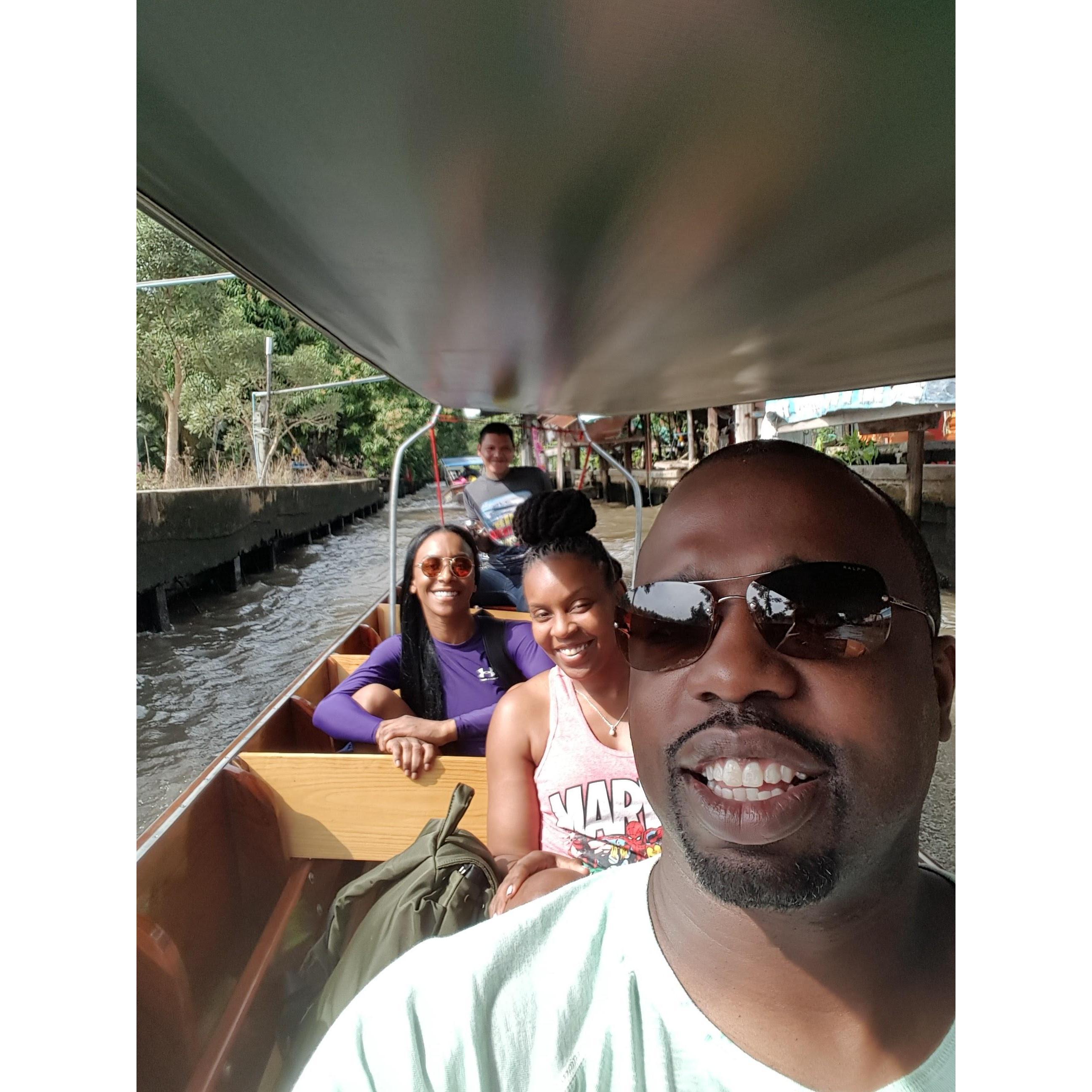Cruising through the floating market near Chiang Mai, Thailand