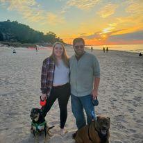 A beach sunset with our boys, Toby and Rex. A tradition we love.