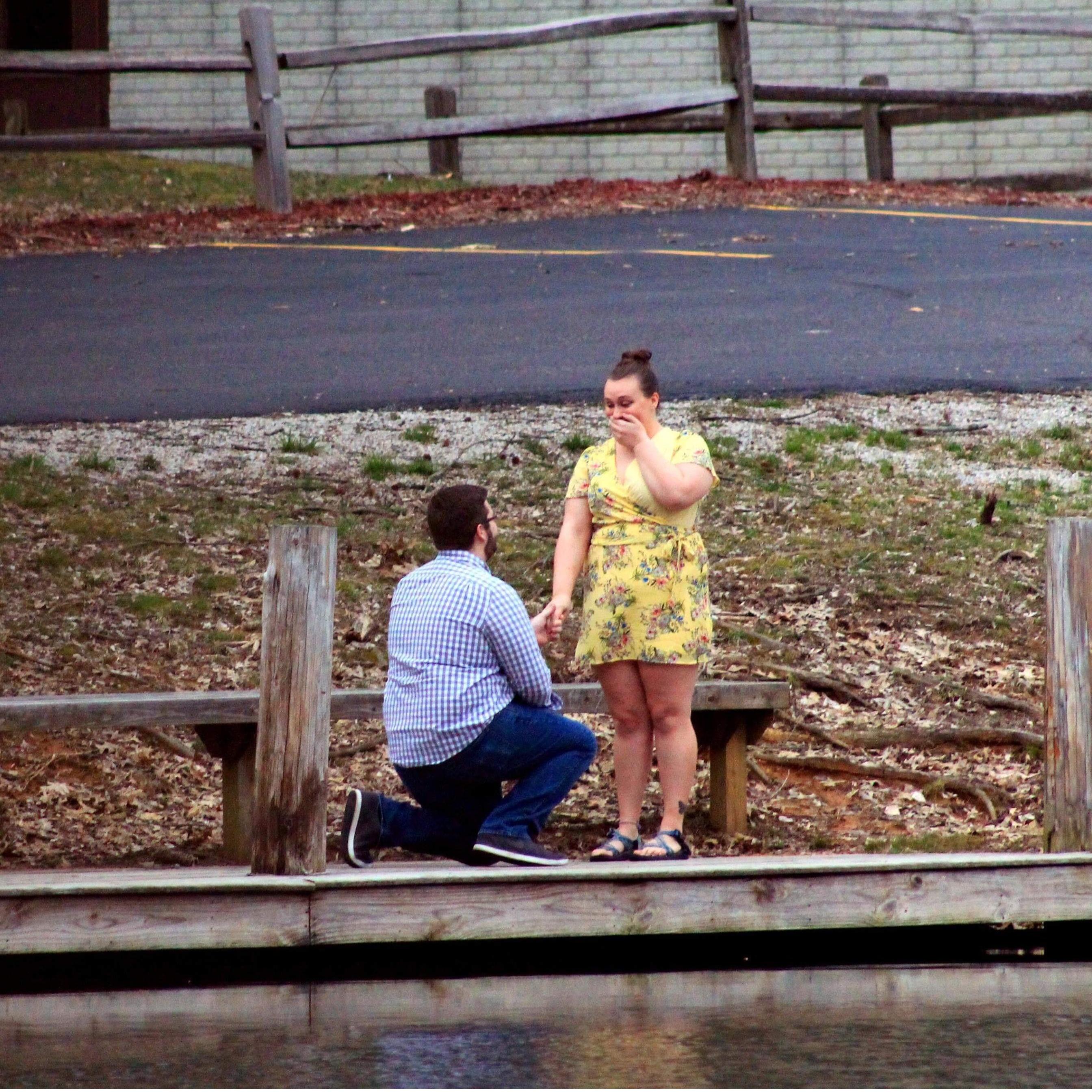 He was able to pull off a surprise proposal at camp where they met!