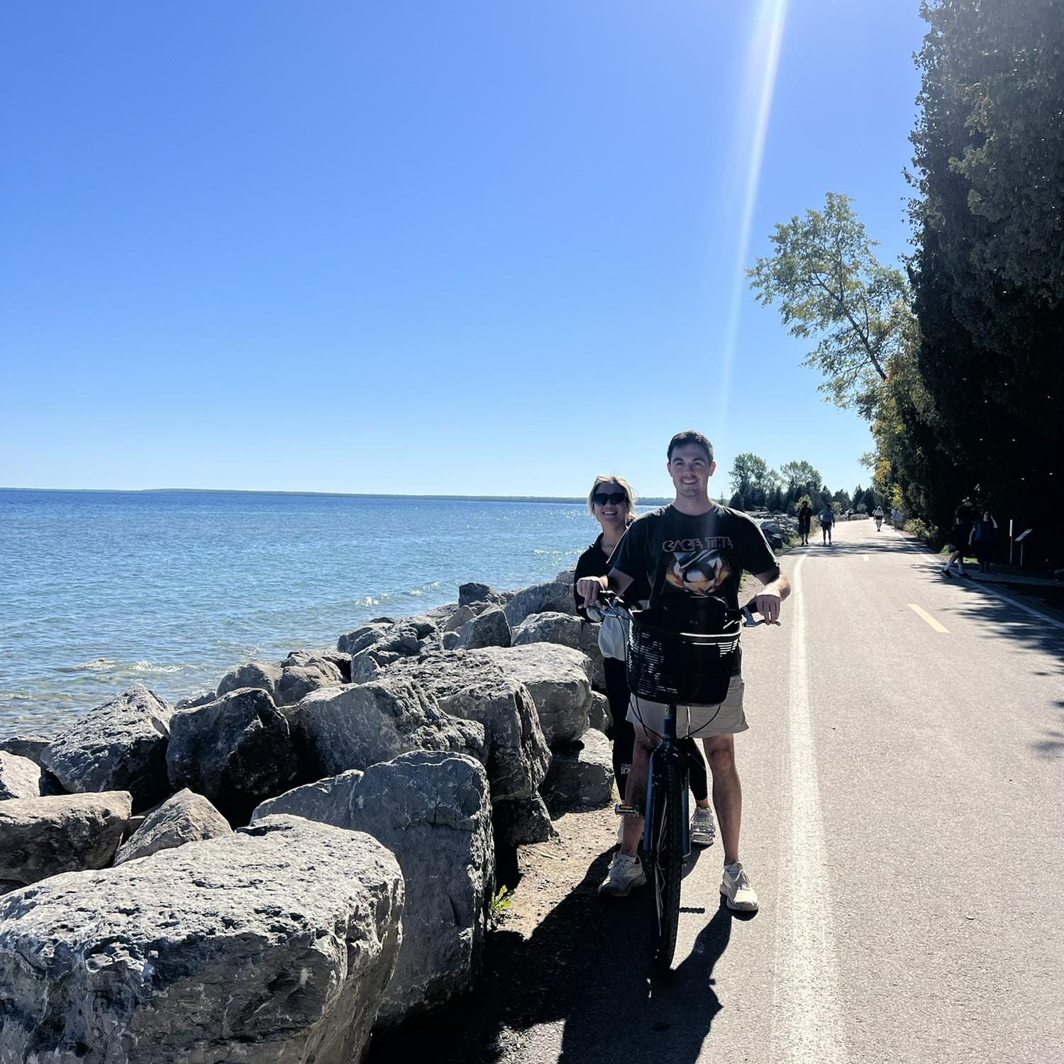 First time riding a tandem bike together, (and maybe the last, but not according to the bride!)