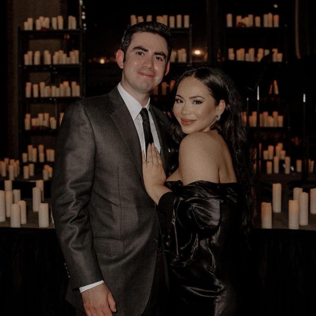 The night of the engagement. Luis proposed at a candlelight symphony while an orchestra played Lover by Taylor Swift.