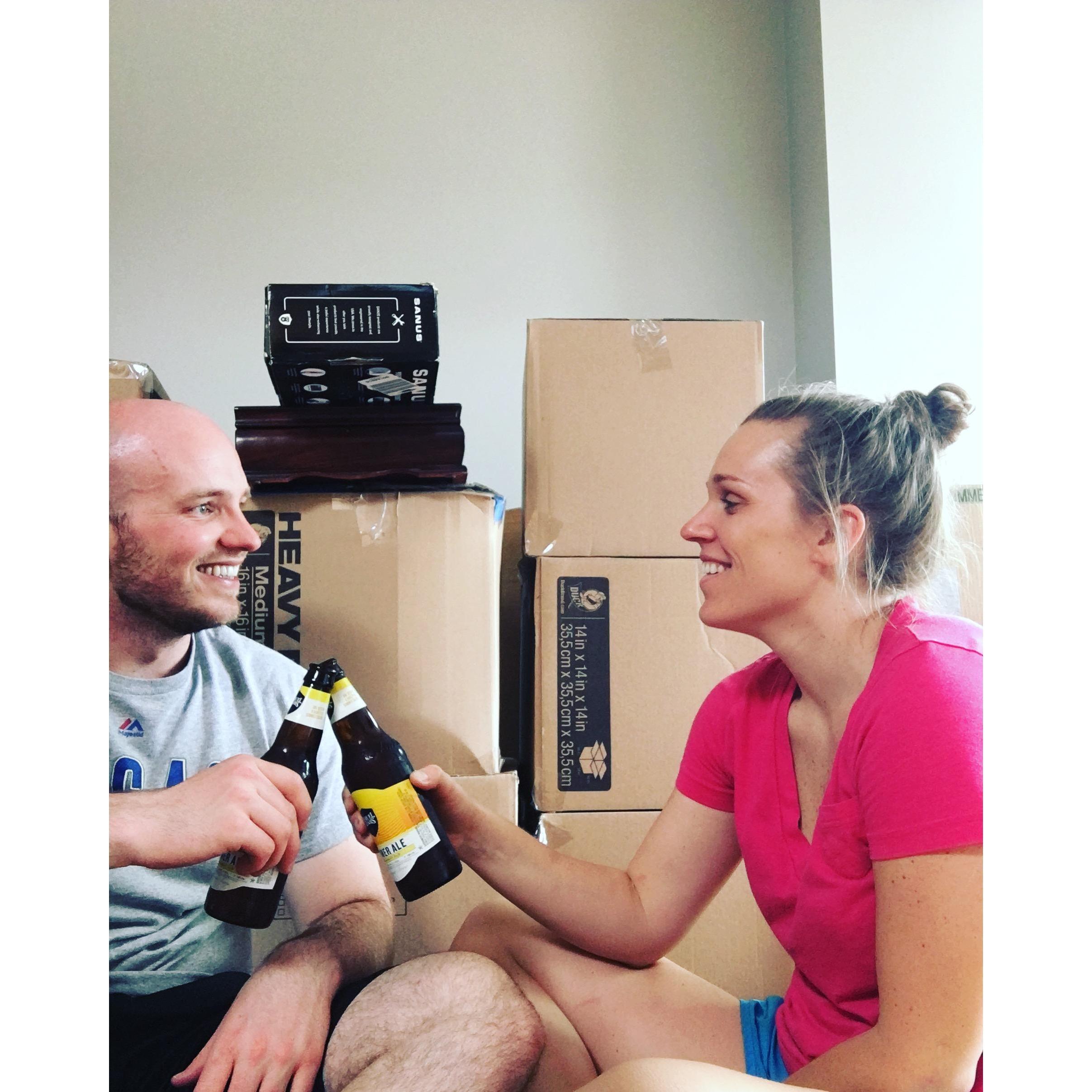 (June 2017) We moved into our apartment! After A LOT of sweat and a couple tears shed by Sarah, we got moved in and had a Sam Adams while sitting on the dining room floor.